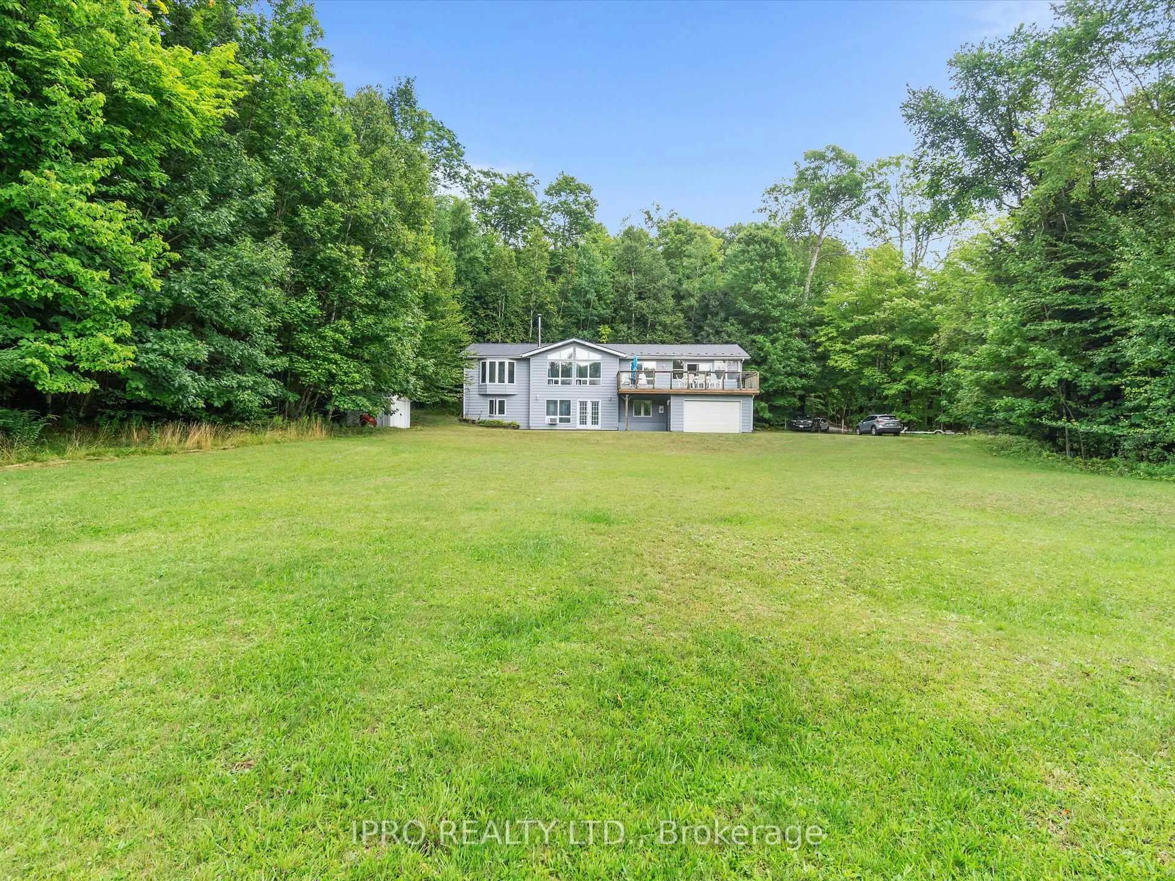 A pic from outside/outdoor area/front of a property/back of a property/a pic from drone, water/lake/river/ocean view for 6 Lower Lane, Seguin Ontario P2A 2W8