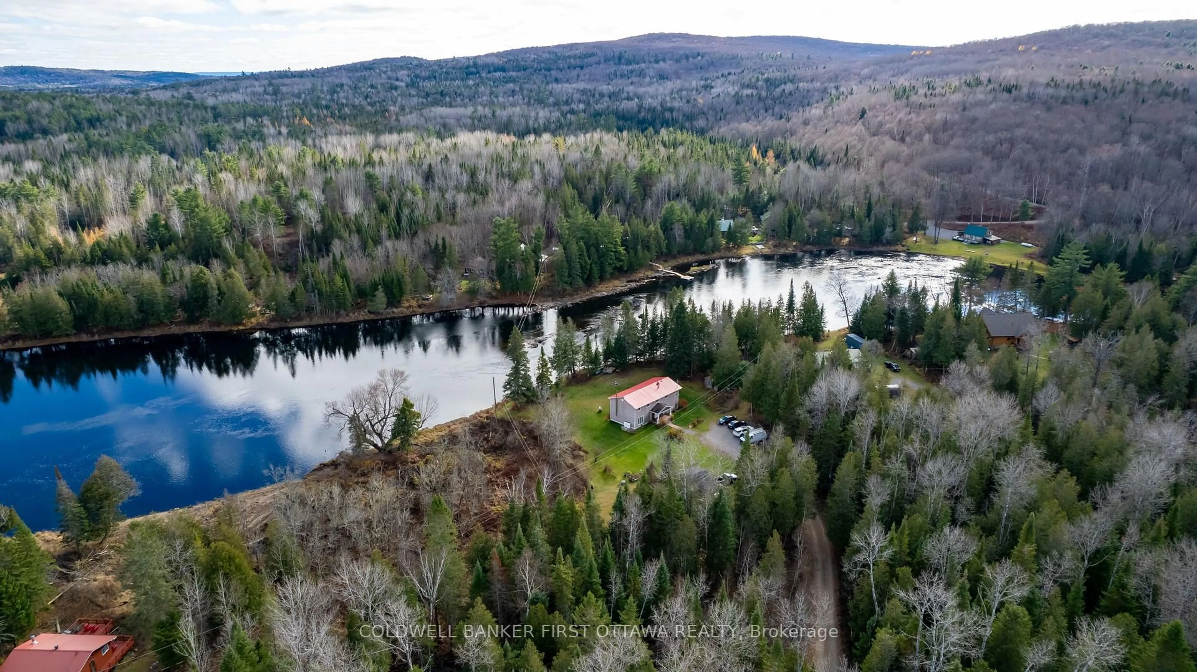 A pic from outside/outdoor area/front of a property/back of a property/a pic from drone, water/lake/river/ocean view for 27 Harrison Tr, Griffith Ontario K0J 2R0