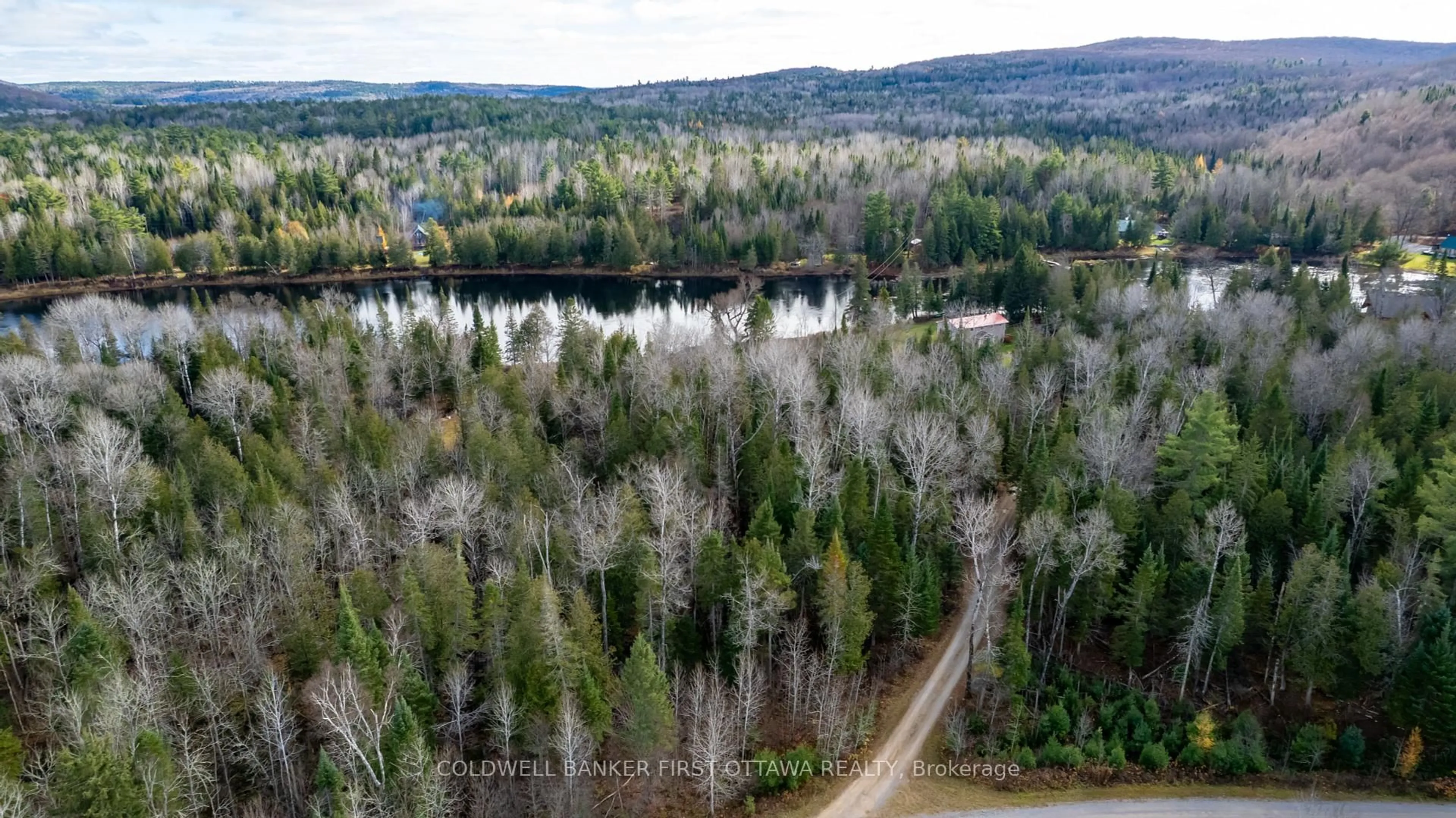 A pic from outside/outdoor area/front of a property/back of a property/a pic from drone, forest/trees view for 27 Harrison Tr, Griffith Ontario K0J 2R0
