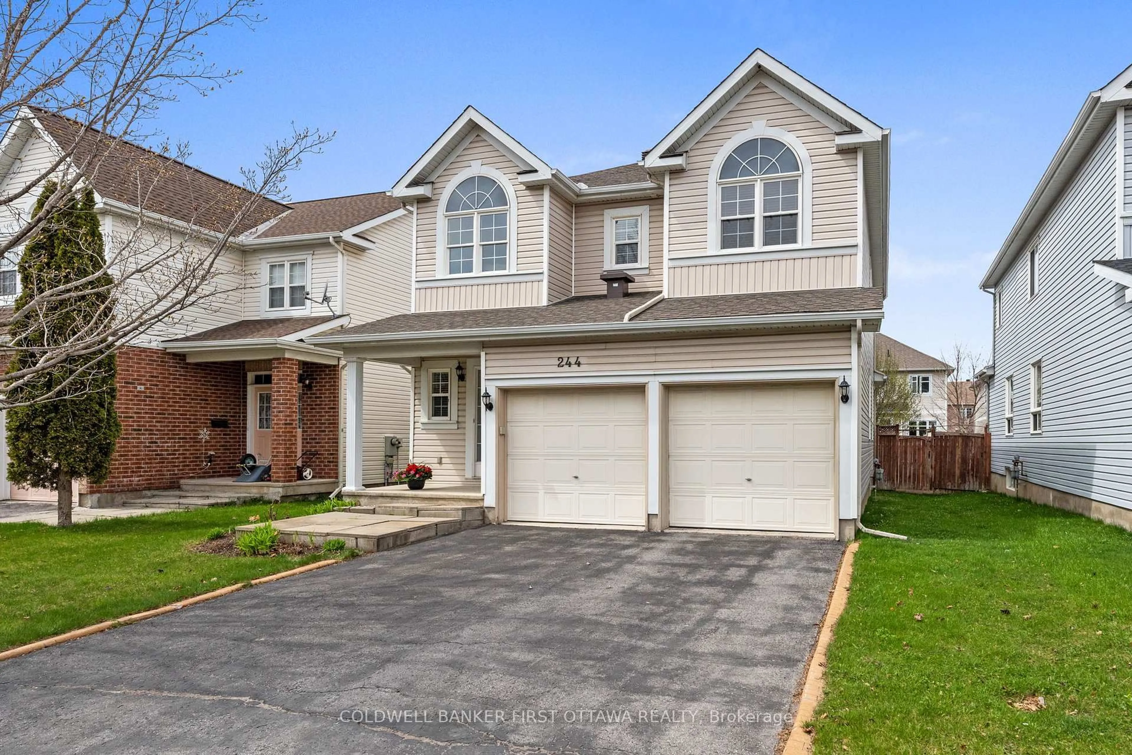 Home with brick exterior material, street for 244 Deercroft Ave, Ottawa Ontario K2J 5J9
