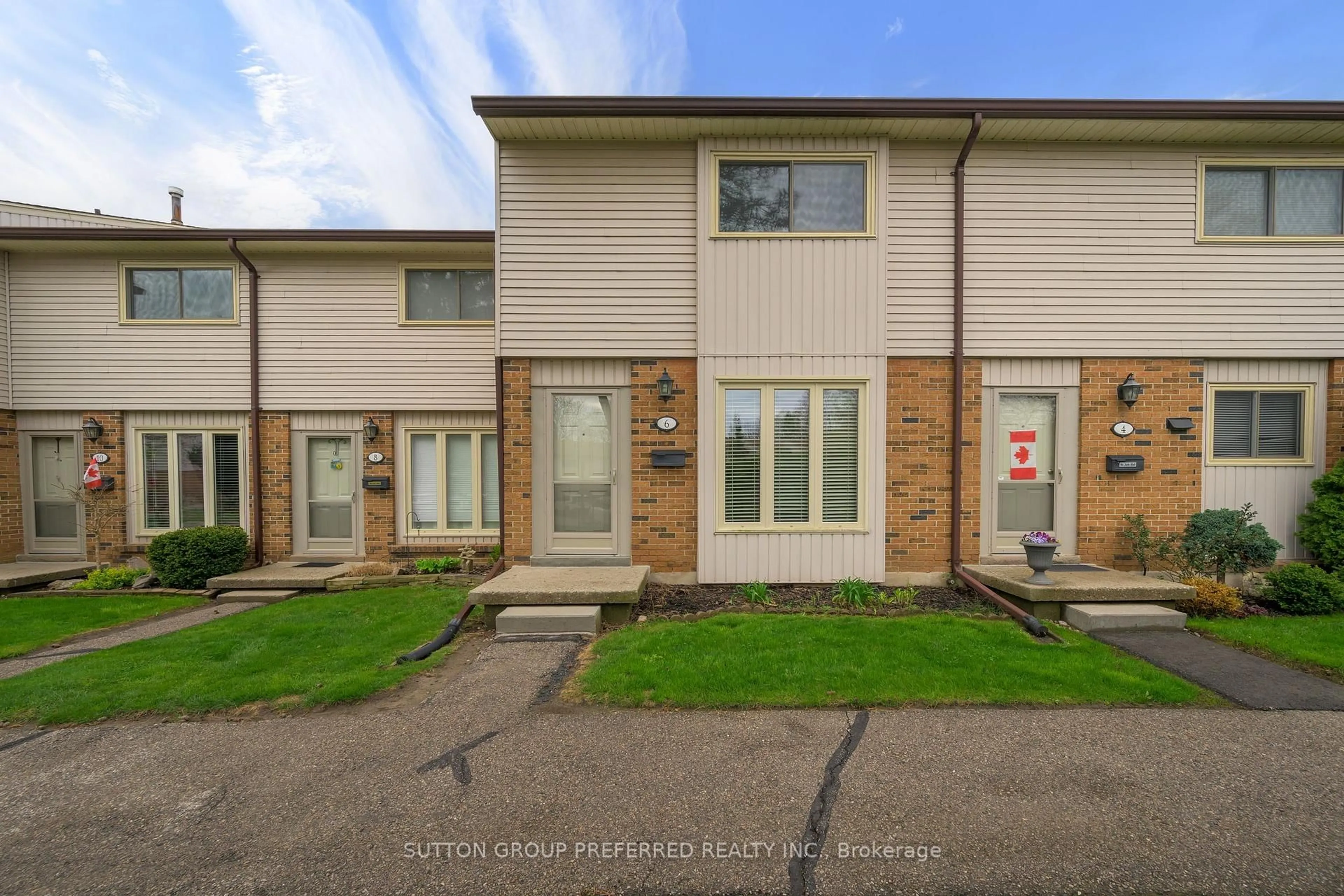 A pic from outside/outdoor area/front of a property/back of a property/a pic from drone, street for 1328 Commissioners Rd #6, London South Ontario N6K 2Y6