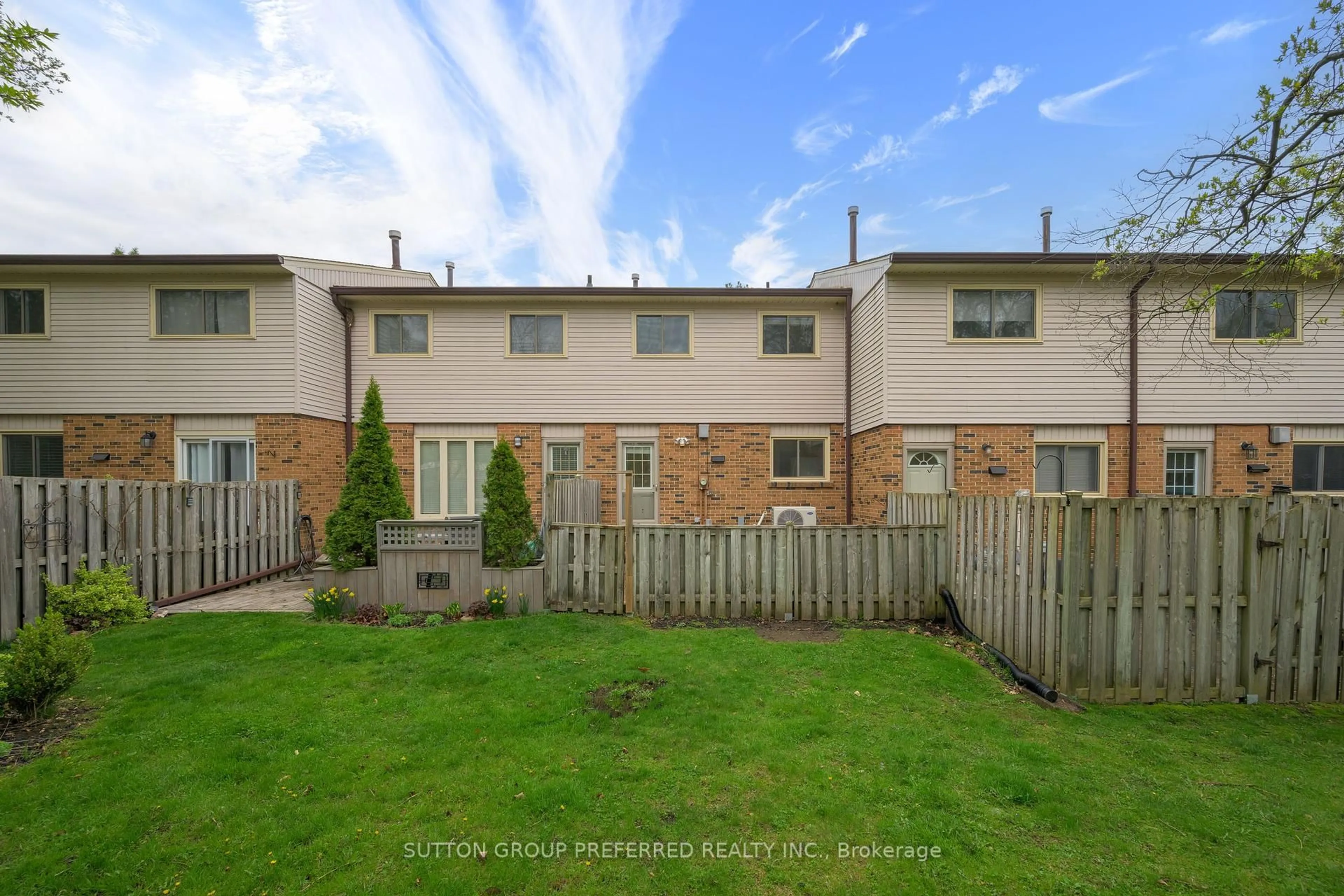 A pic from outside/outdoor area/front of a property/back of a property/a pic from drone, street for 1328 Commissioners Rd #6, London South Ontario N6K 2Y6