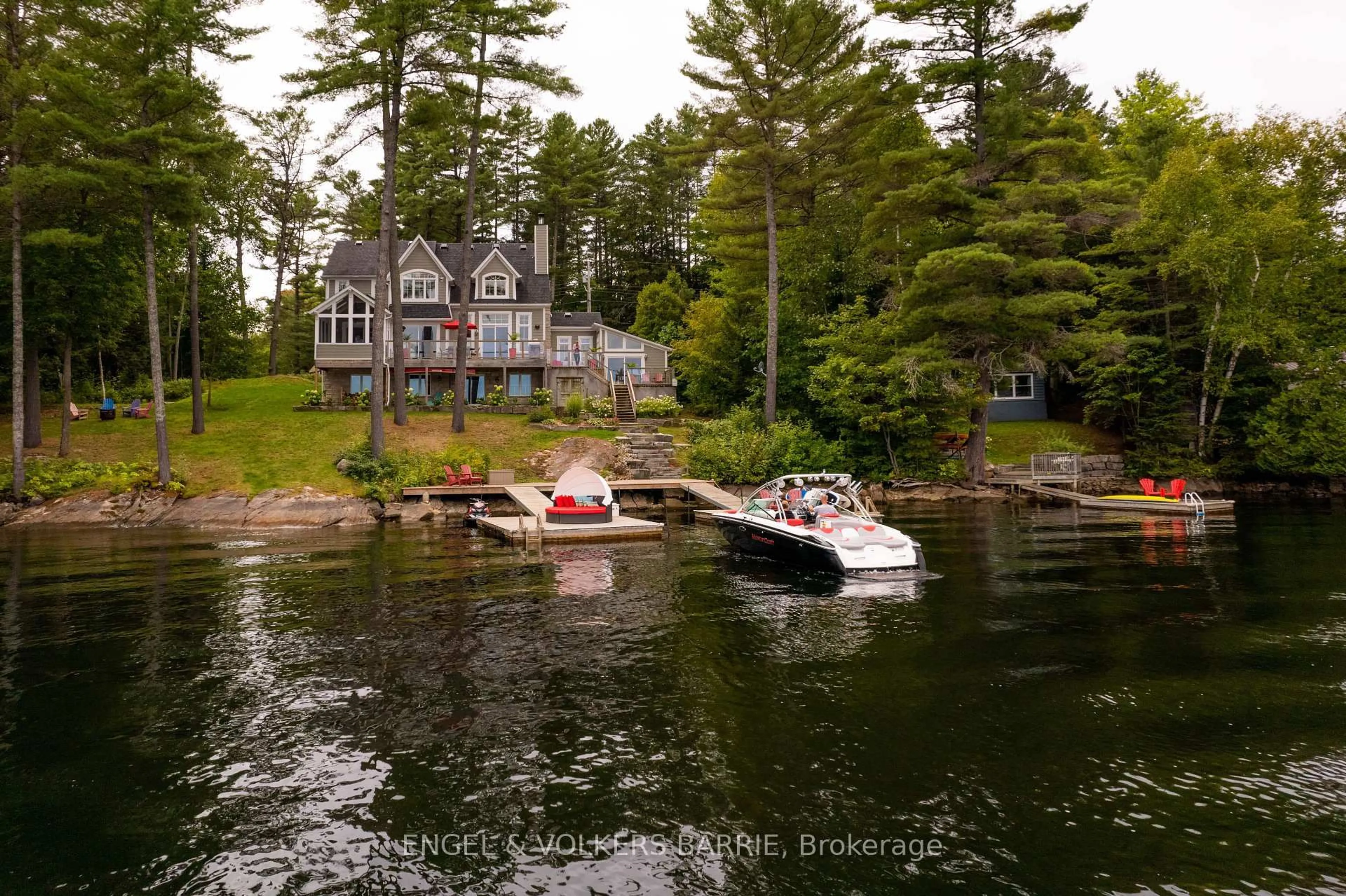 A pic from outside/outdoor area/front of a property/back of a property/a pic from drone, water/lake/river/ocean view for 1043 FORTUNES Tr, Algonquin Highlands Ontario K0M 1S0