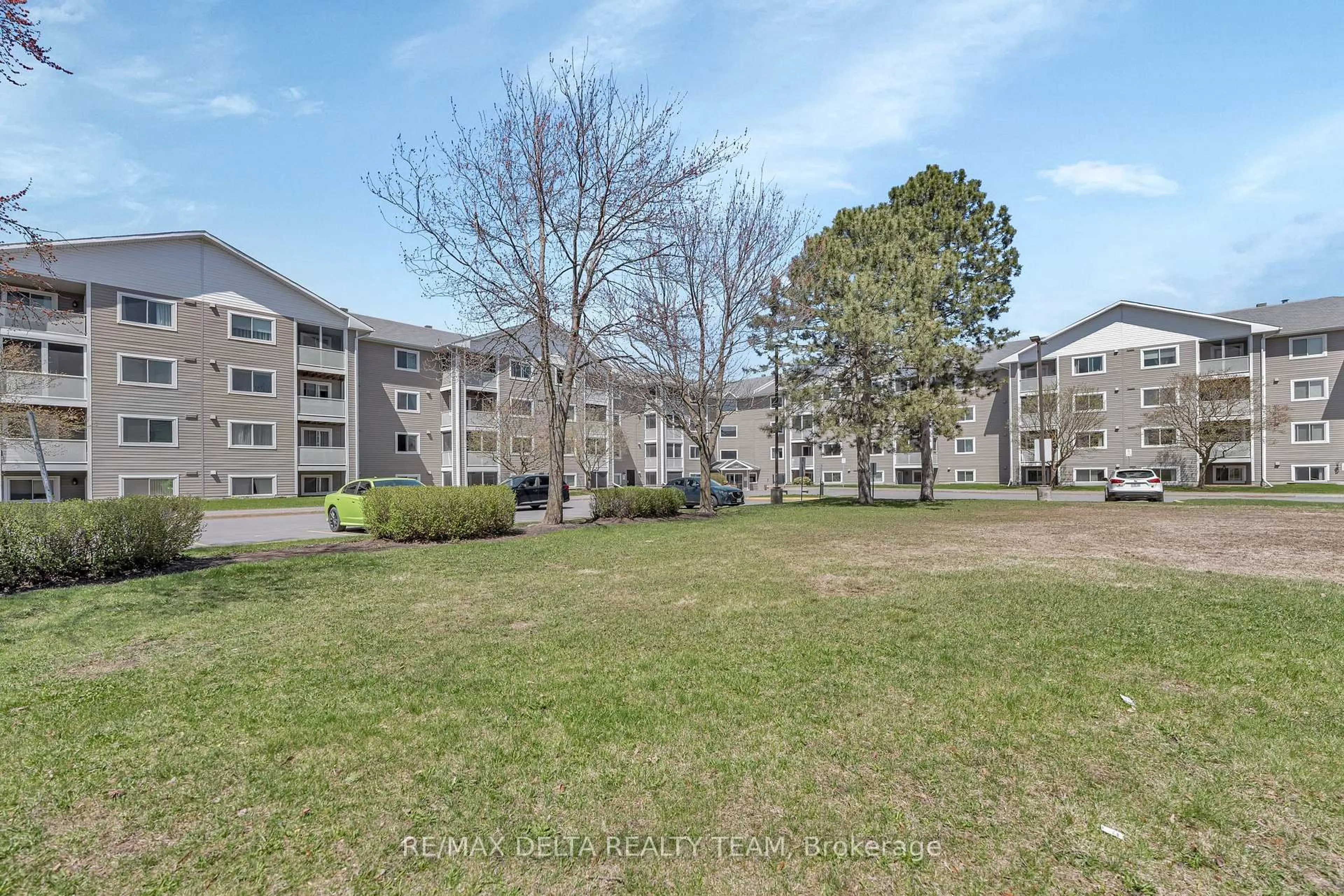 A pic from outside/outdoor area/front of a property/back of a property/a pic from drone, mountain view for 316 Lorry Greenberg Dr #306, Ottawa Ontario K1T 2P4