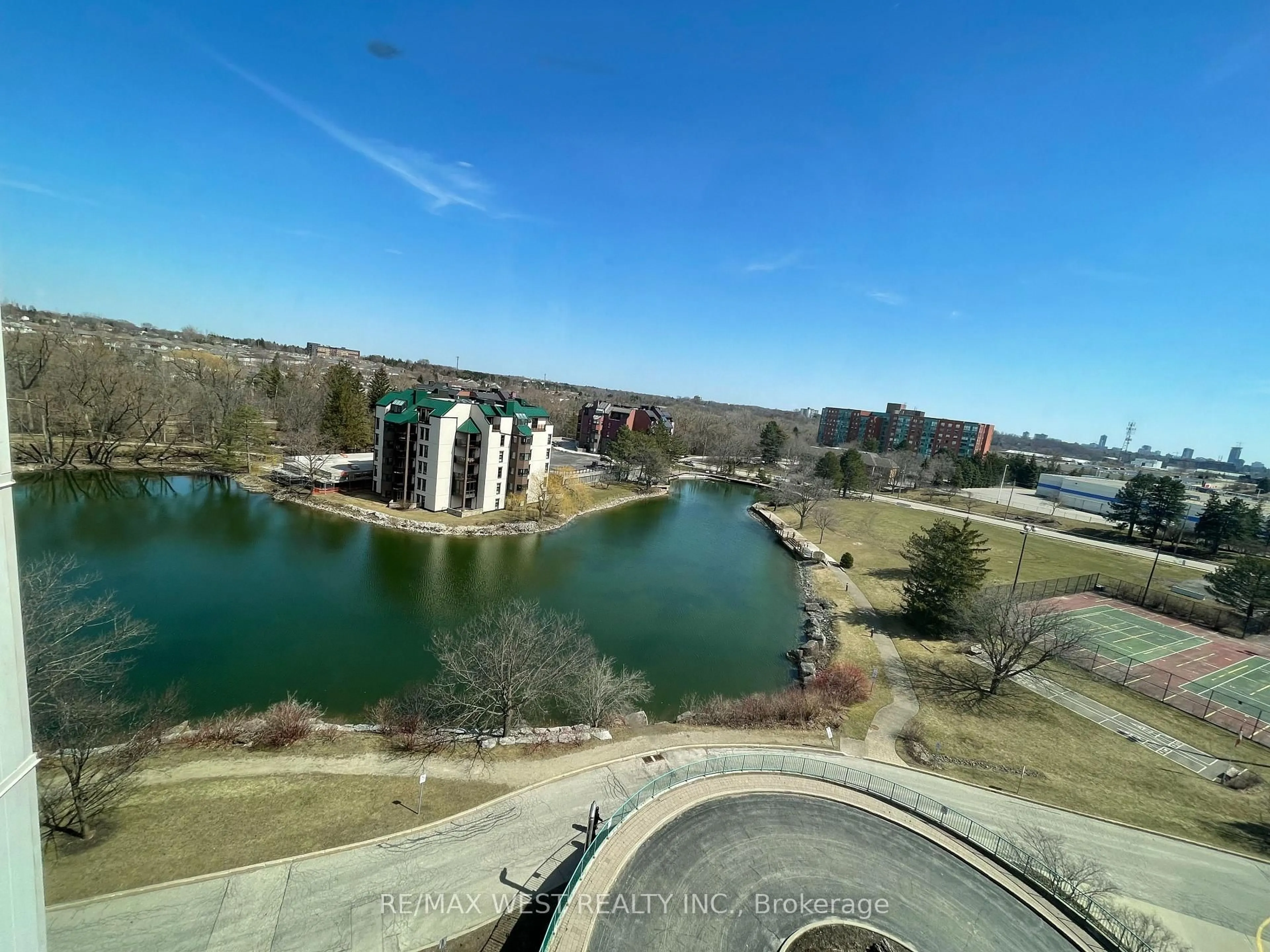 A pic from outside/outdoor area/front of a property/back of a property/a pic from drone, water/lake/river/ocean view for 30 Blue Springs Dr #411, Waterloo Ontario N2J 4T2