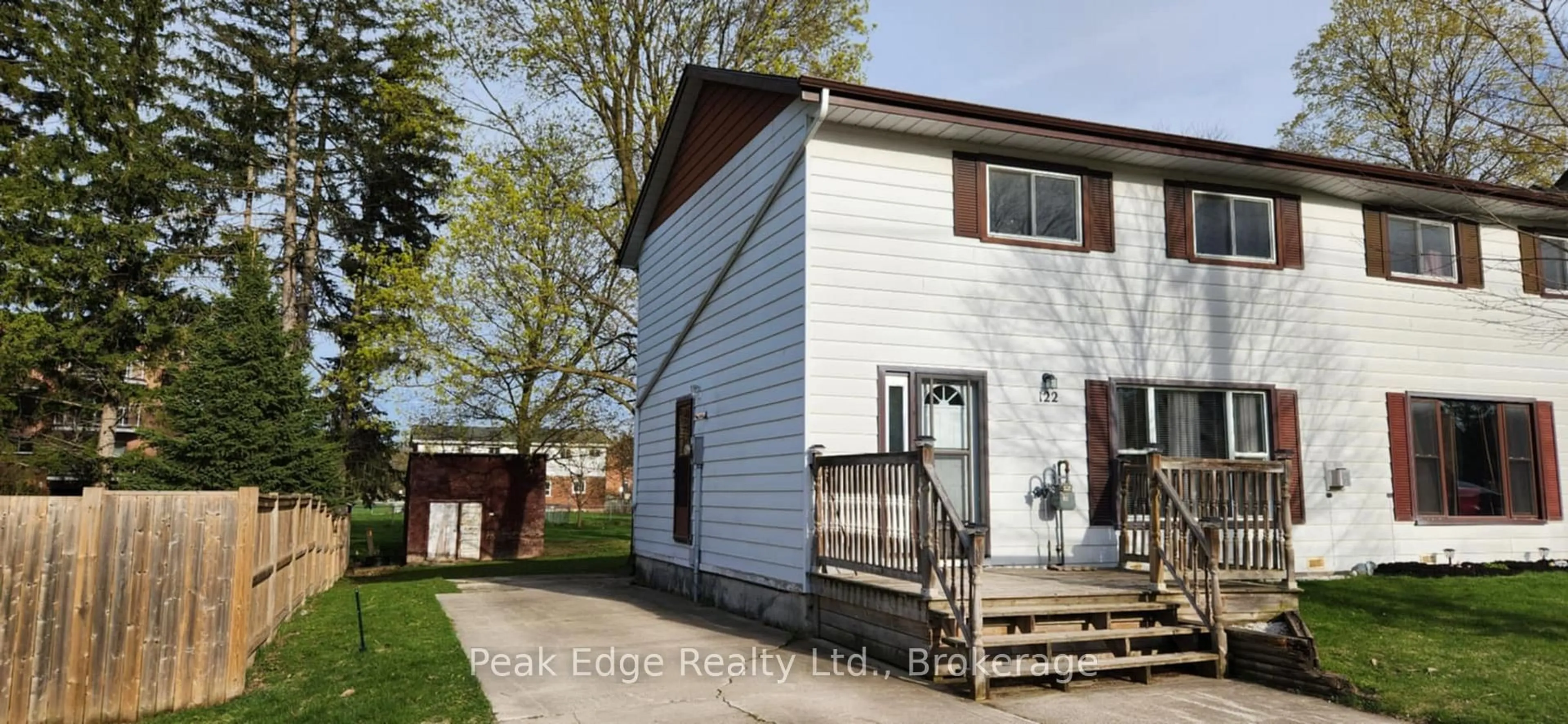 Home with vinyl exterior material, street for 122 Gibson St, Brockton Ontario N0G 2V0