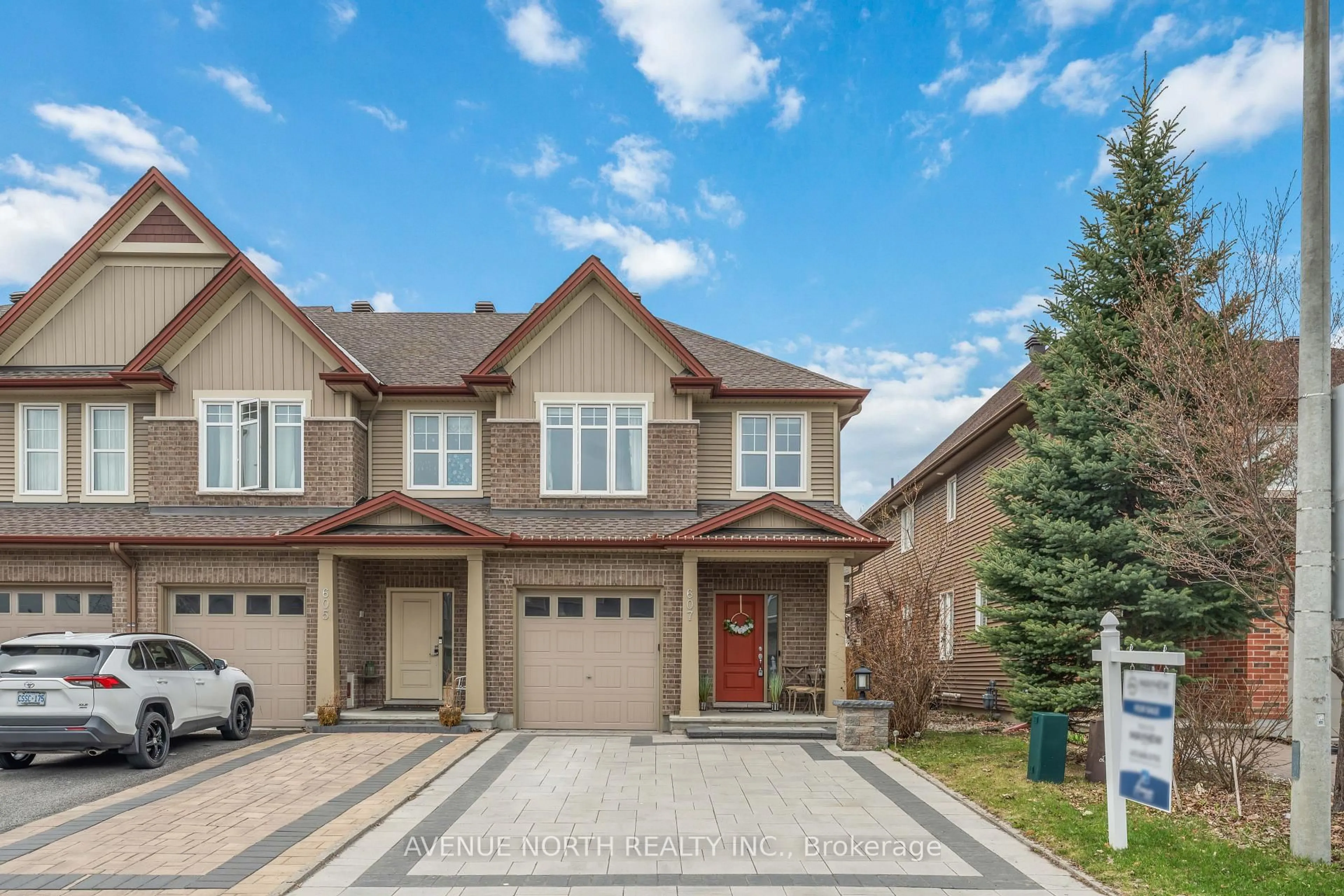 Home with brick exterior material, street for 607 Willowmere Way, Ottawa Ontario K1T 0K2