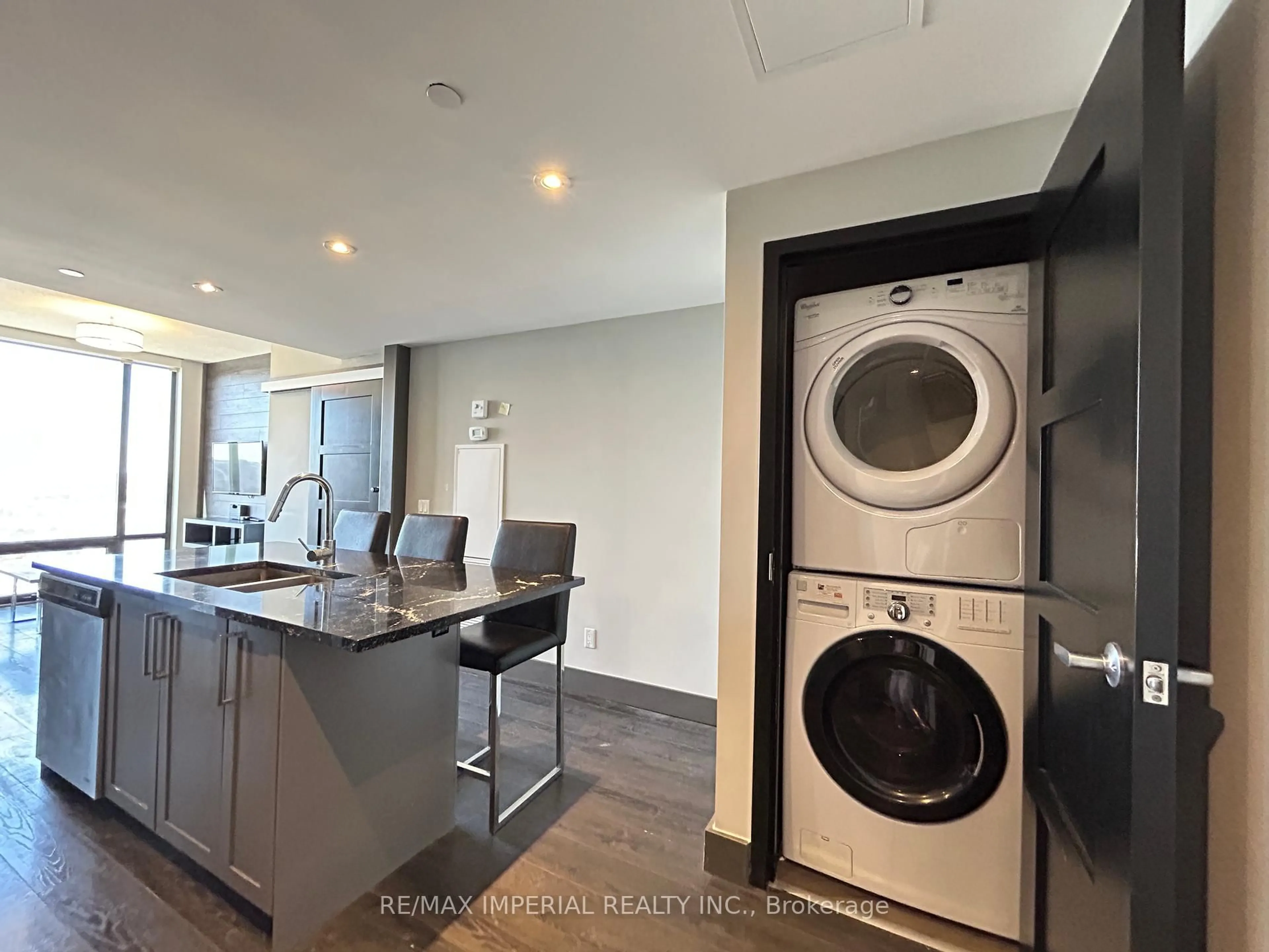 Kitchen with laundary machines, unknown for 330 Phillip St #N2502, Waterloo Ontario N2L 3W9