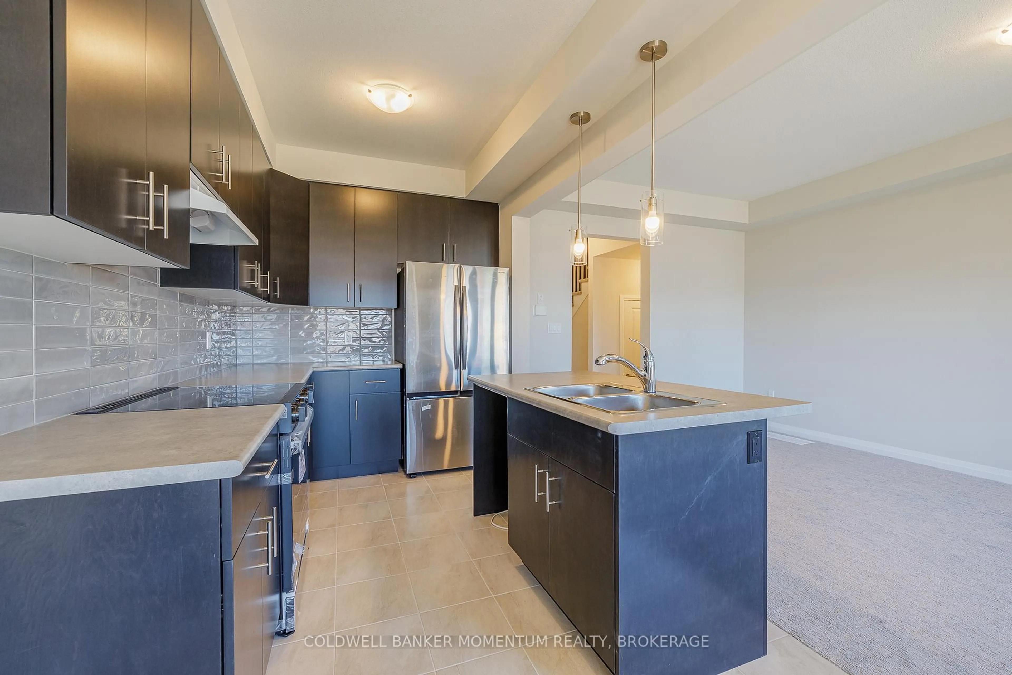 Open concept kitchen, ceramic/tile floor for 7374 Marvel Dr, Niagara Falls Ontario L2H 3V4