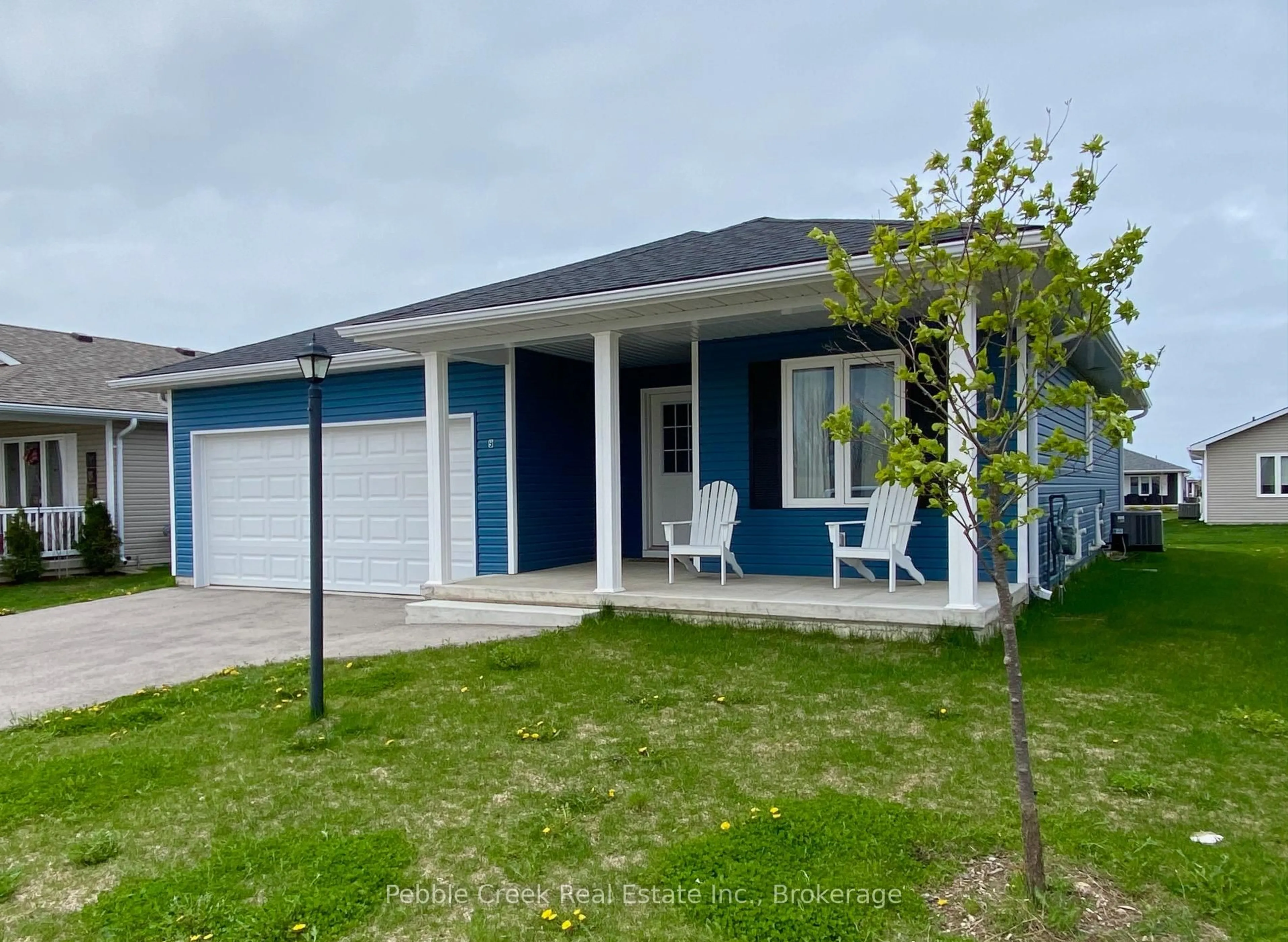 Home with vinyl exterior material, street for 9 Sweet Water Dr, Ashfield-Colborne-Wawanosh Ontario N7A 0C1