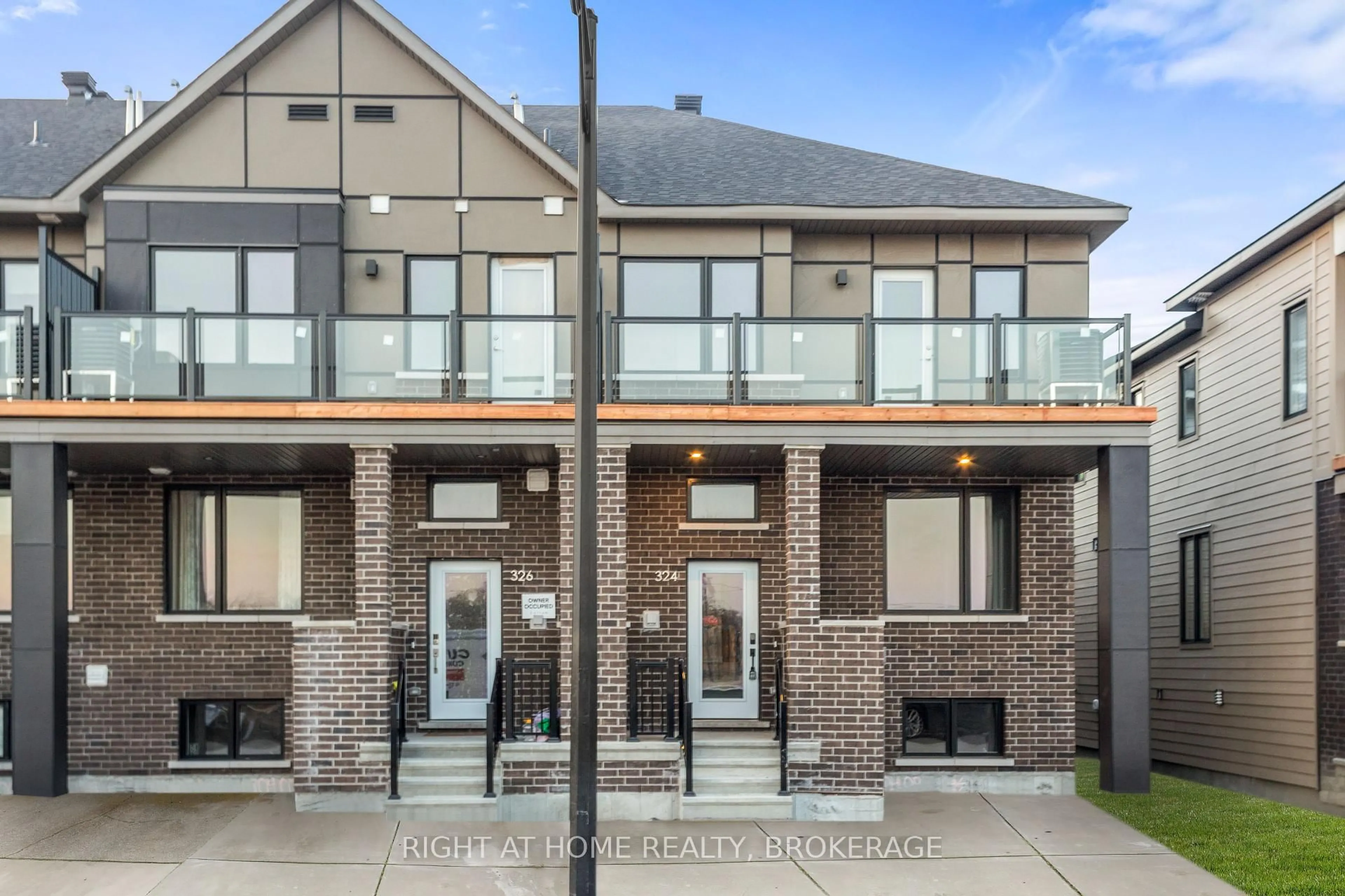 Home with brick exterior material, street for 324 Catsfoot Walk, Ottawa Ontario K2J 7G7