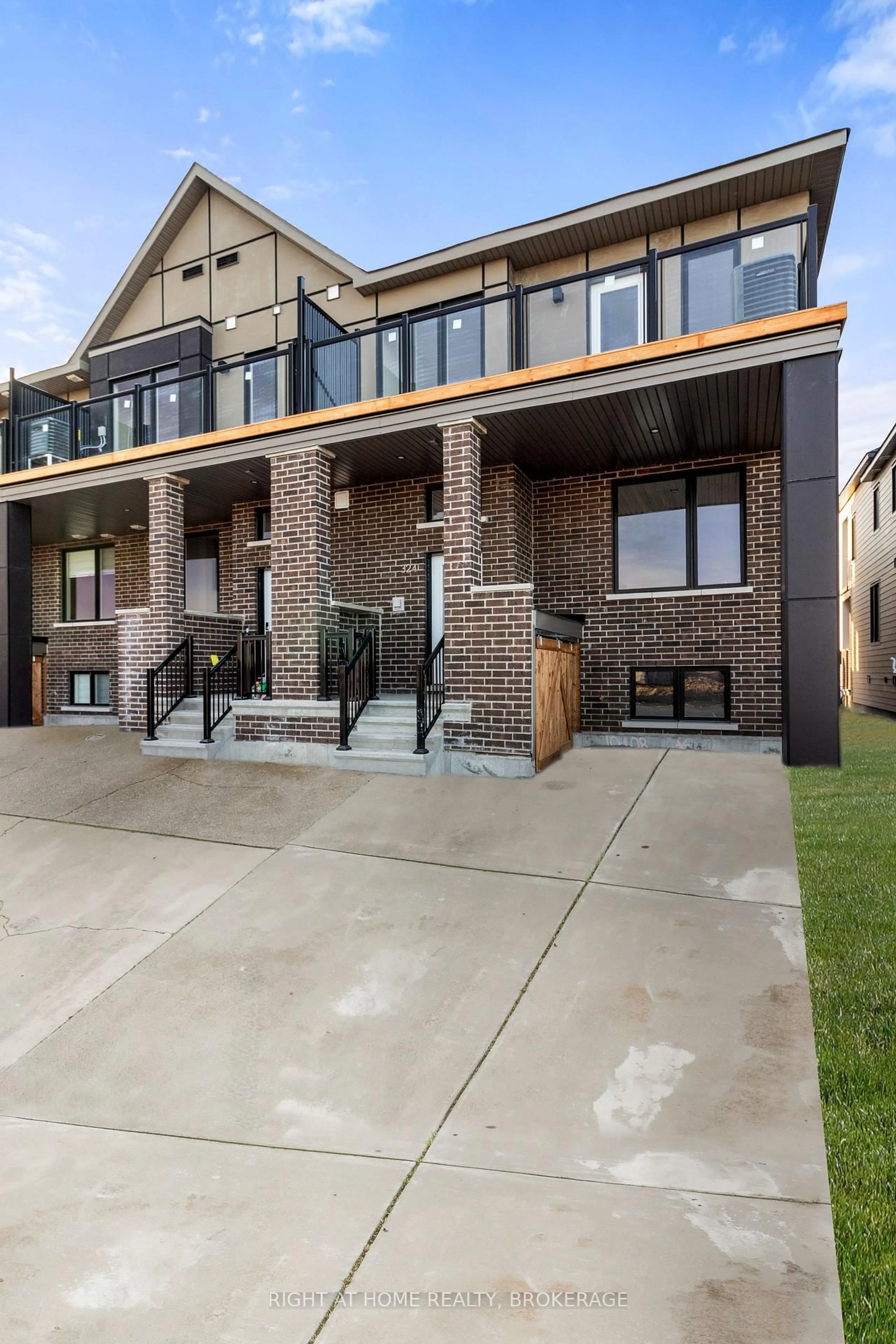 Home with brick exterior material, street for 324 Catsfoot Walk, Ottawa Ontario K2J 7G7