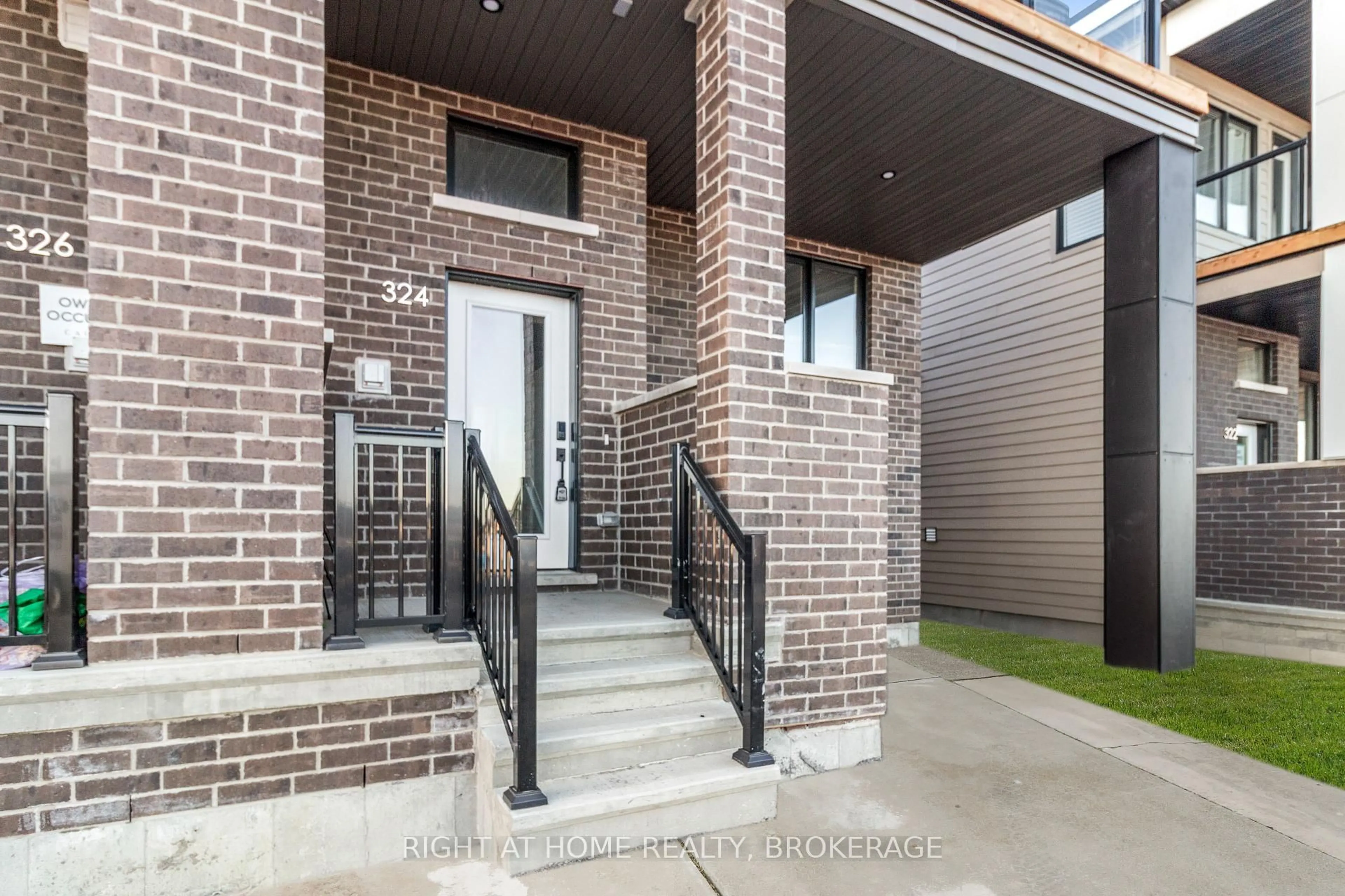 Home with brick exterior material, street for 324 Catsfoot Walk, Ottawa Ontario K2J 7G7