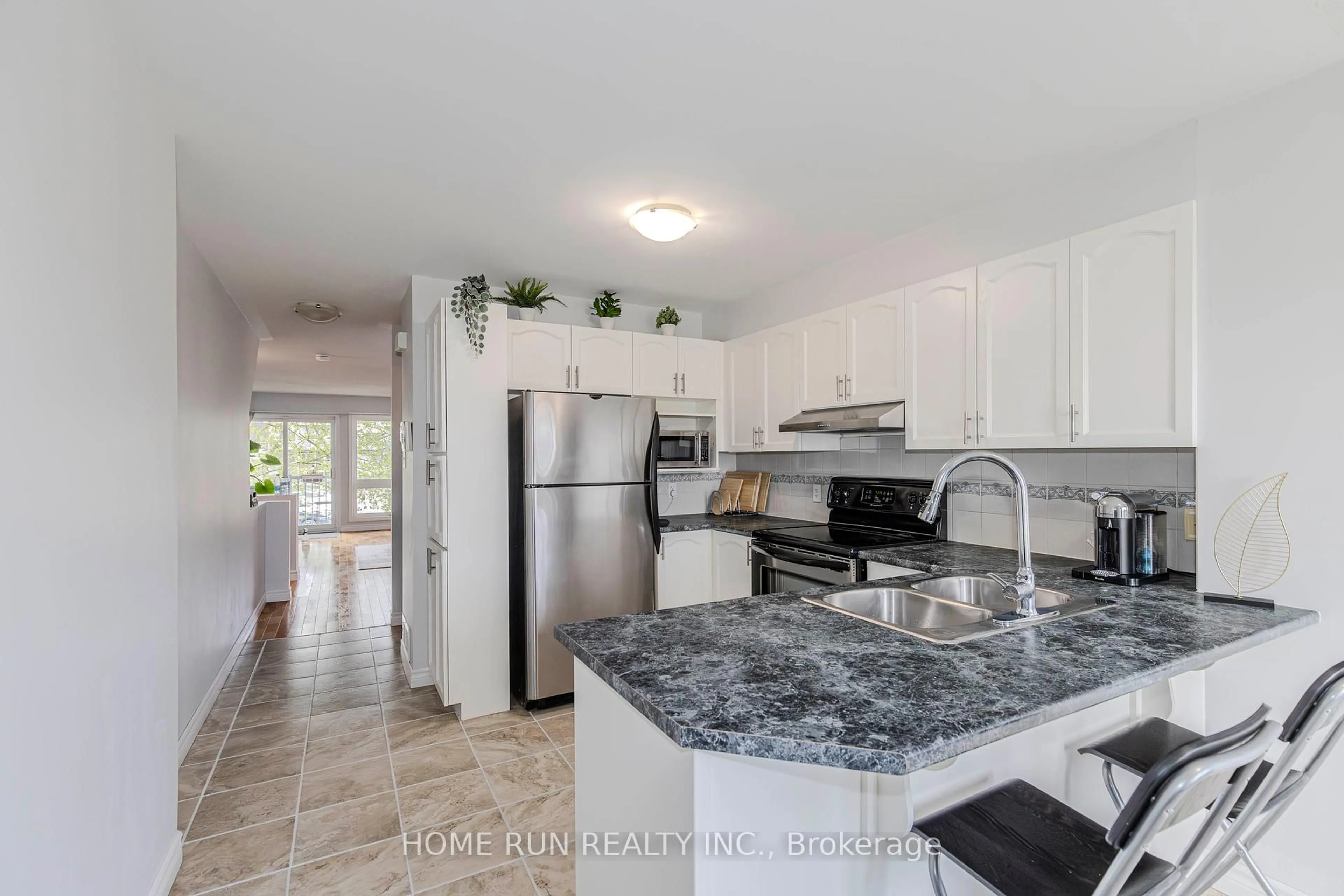Open concept kitchen, ceramic/tile floor for 388 Crownridge Dr, Kanata Ontario K2M 3A4