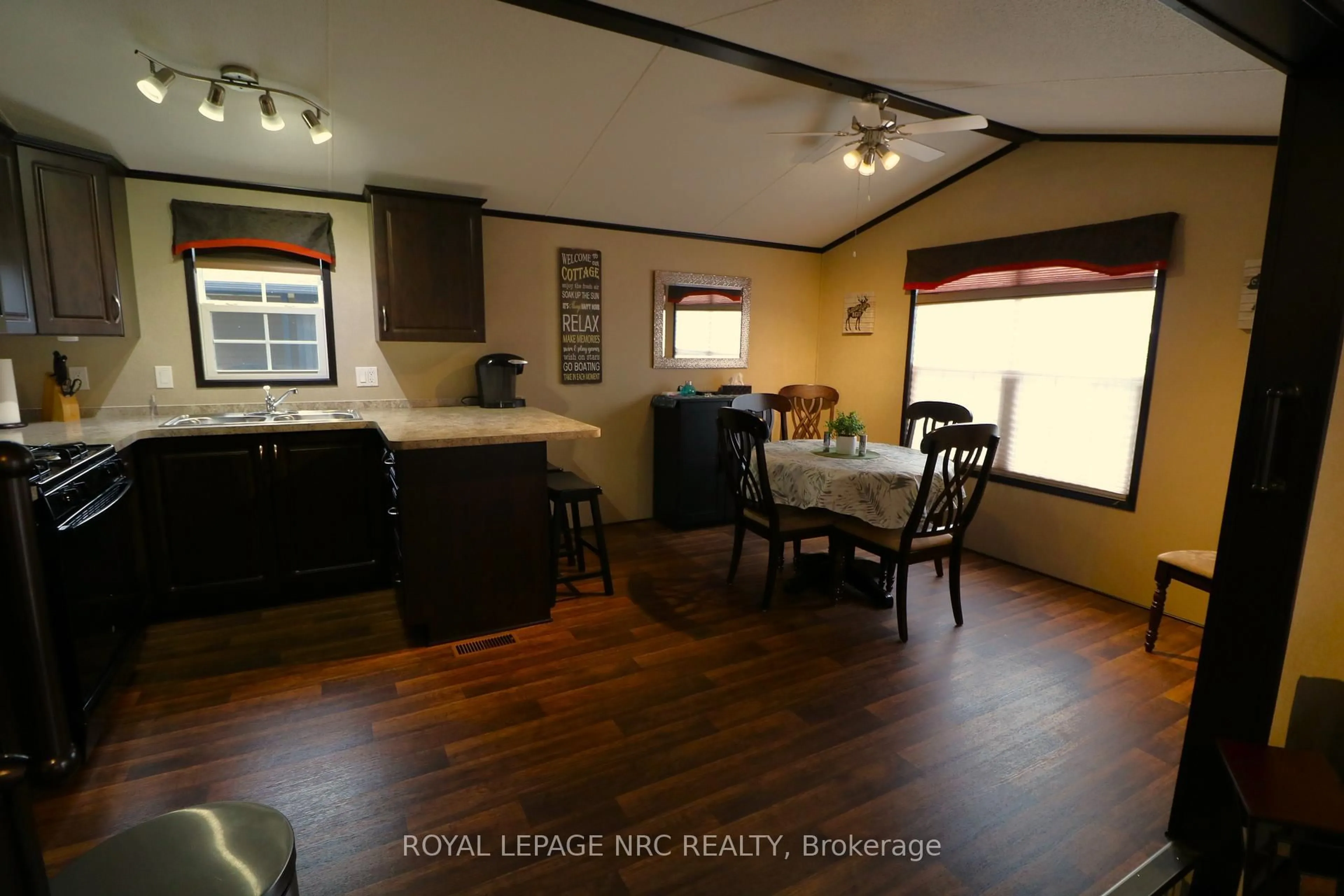 Open concept kitchen, wood/laminate floor for 1501 Line 8 Rd #237, Niagara-on-the-Lake Ontario L0S 1J0