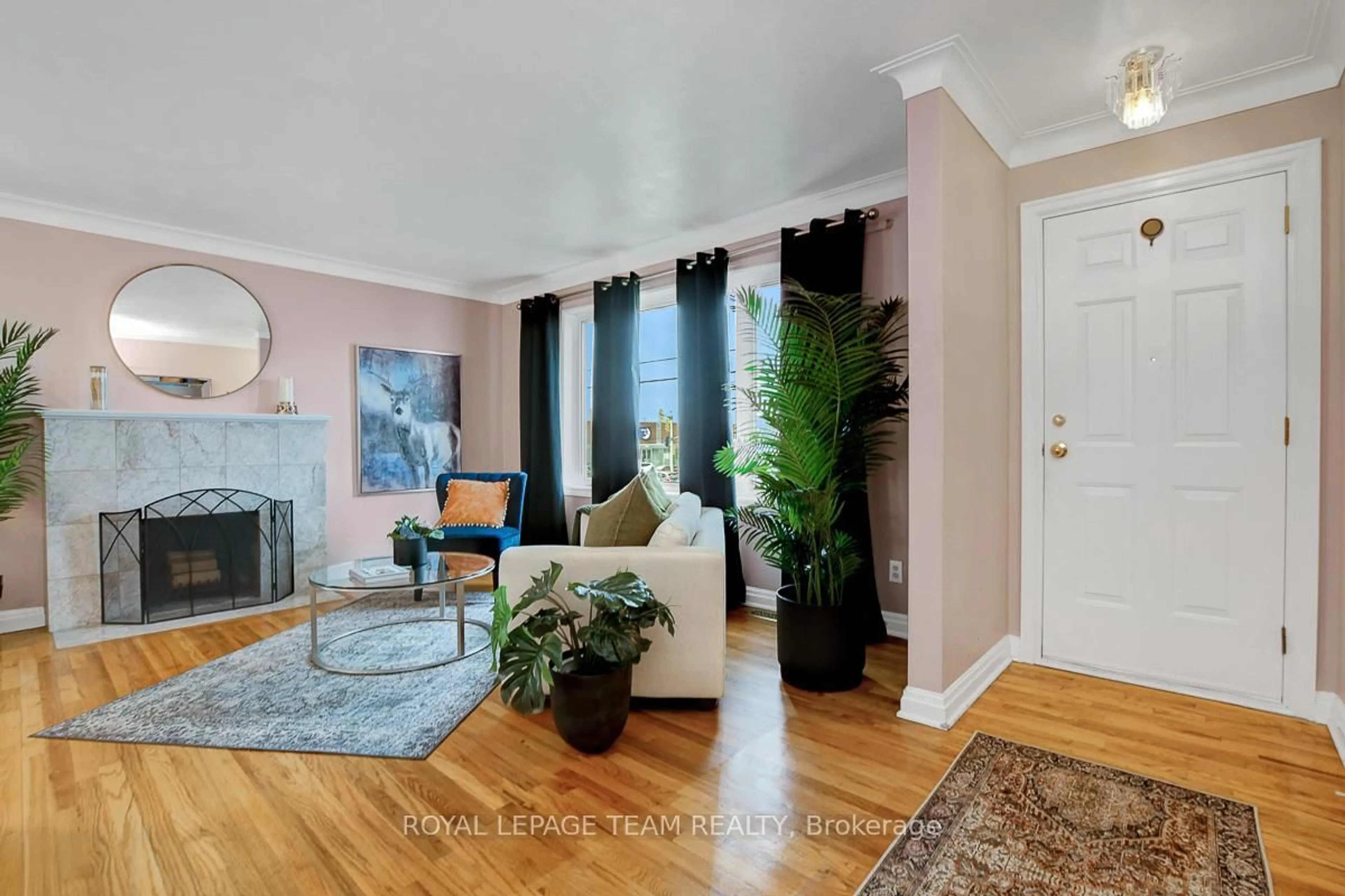 Living room with furniture, unknown for 2027 Ogilvie Rd, Ottawa Ontario K1J 7P1