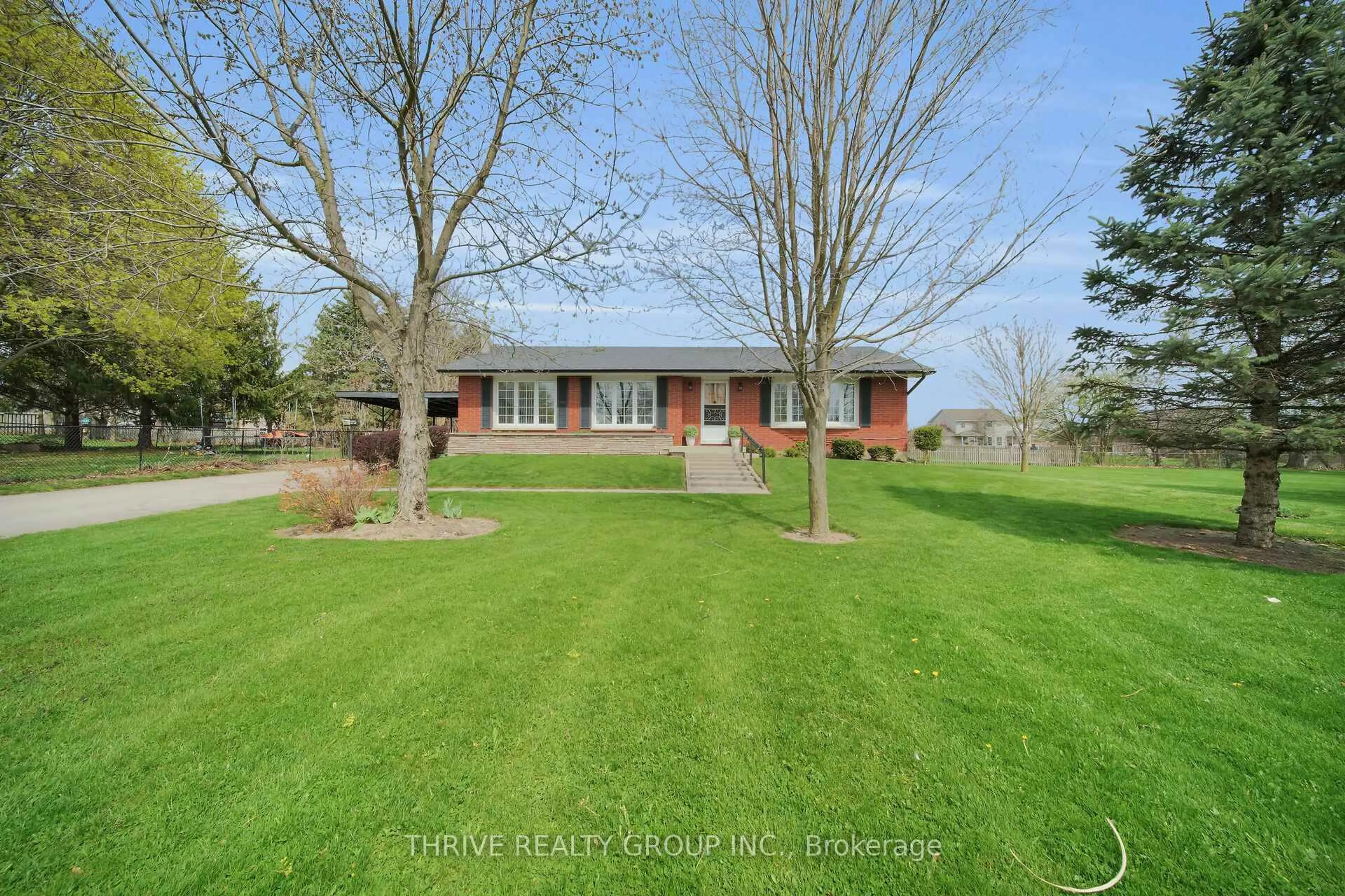 A pic from outside/outdoor area/front of a property/back of a property/a pic from drone, water/lake/river/ocean view for 4036-4050 Elgin Rd, Thames Centre Ontario N0L 1V0