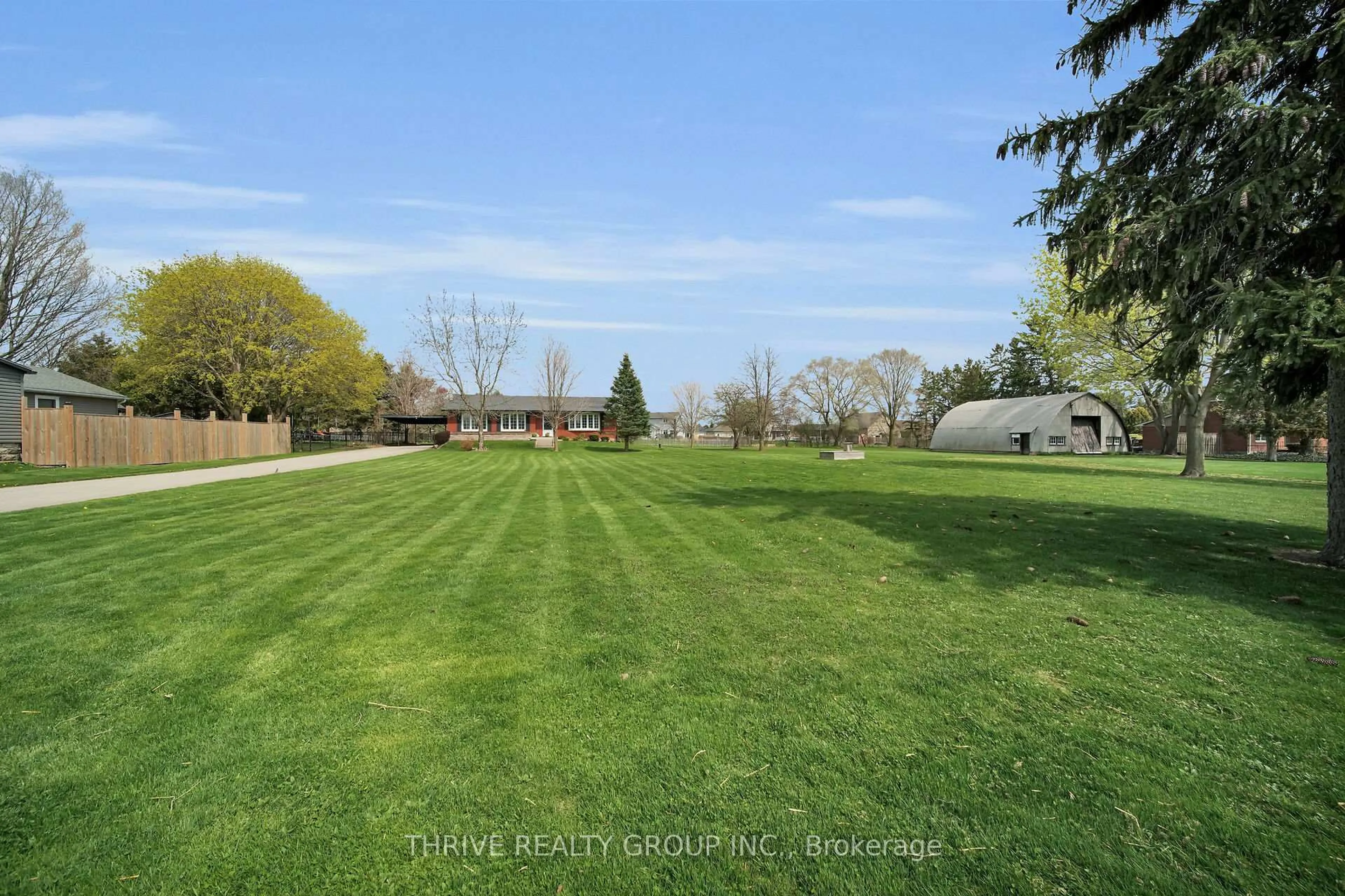 A pic from outside/outdoor area/front of a property/back of a property/a pic from drone, water/lake/river/ocean view for 4036-4050 Elgin Rd, Thames Centre Ontario N0L 1V0