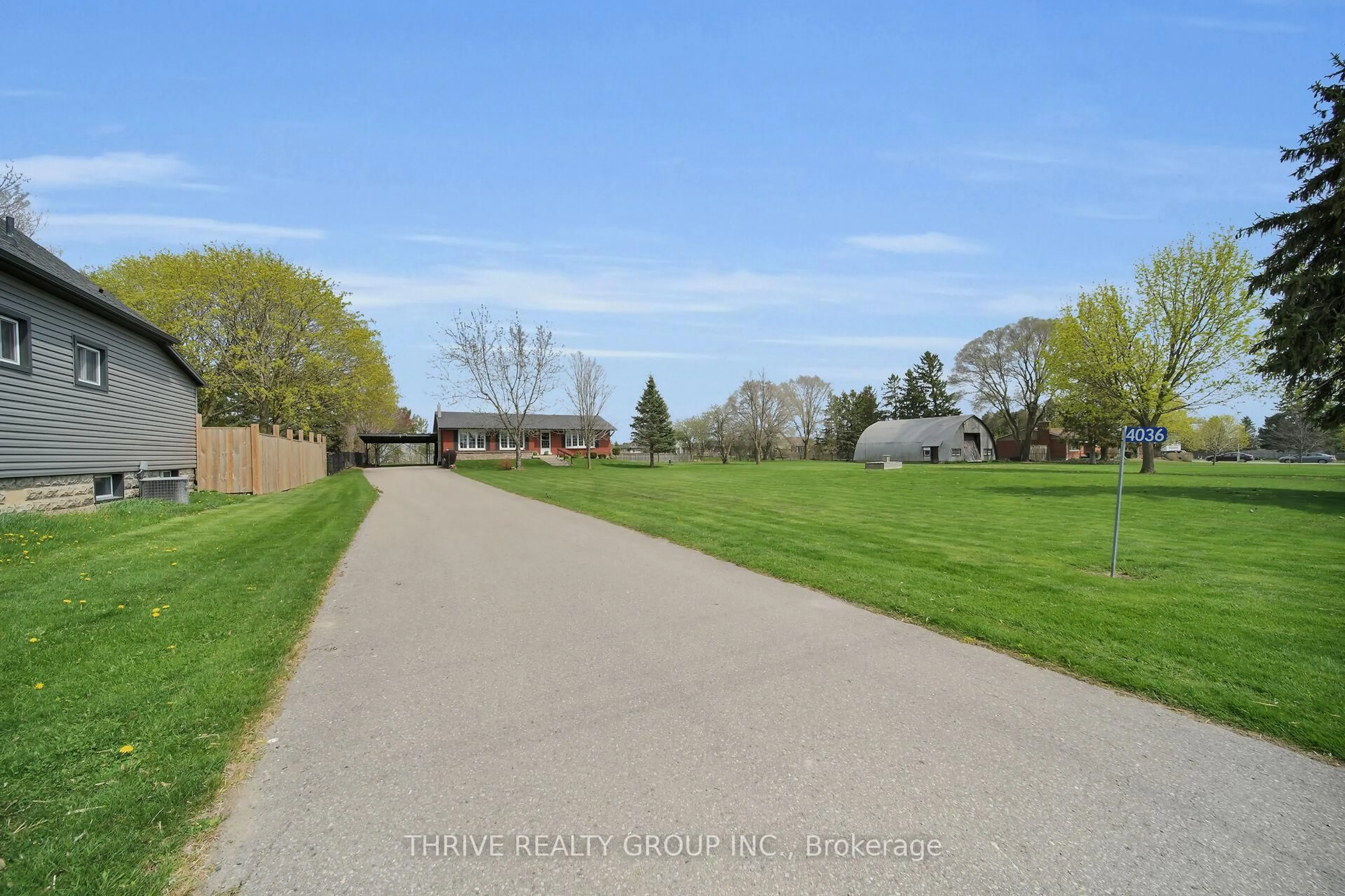 A pic from outside/outdoor area/front of a property/back of a property/a pic from drone, street for 4036-4050 Elgin Rd, Thames Centre Ontario N0L 1V0