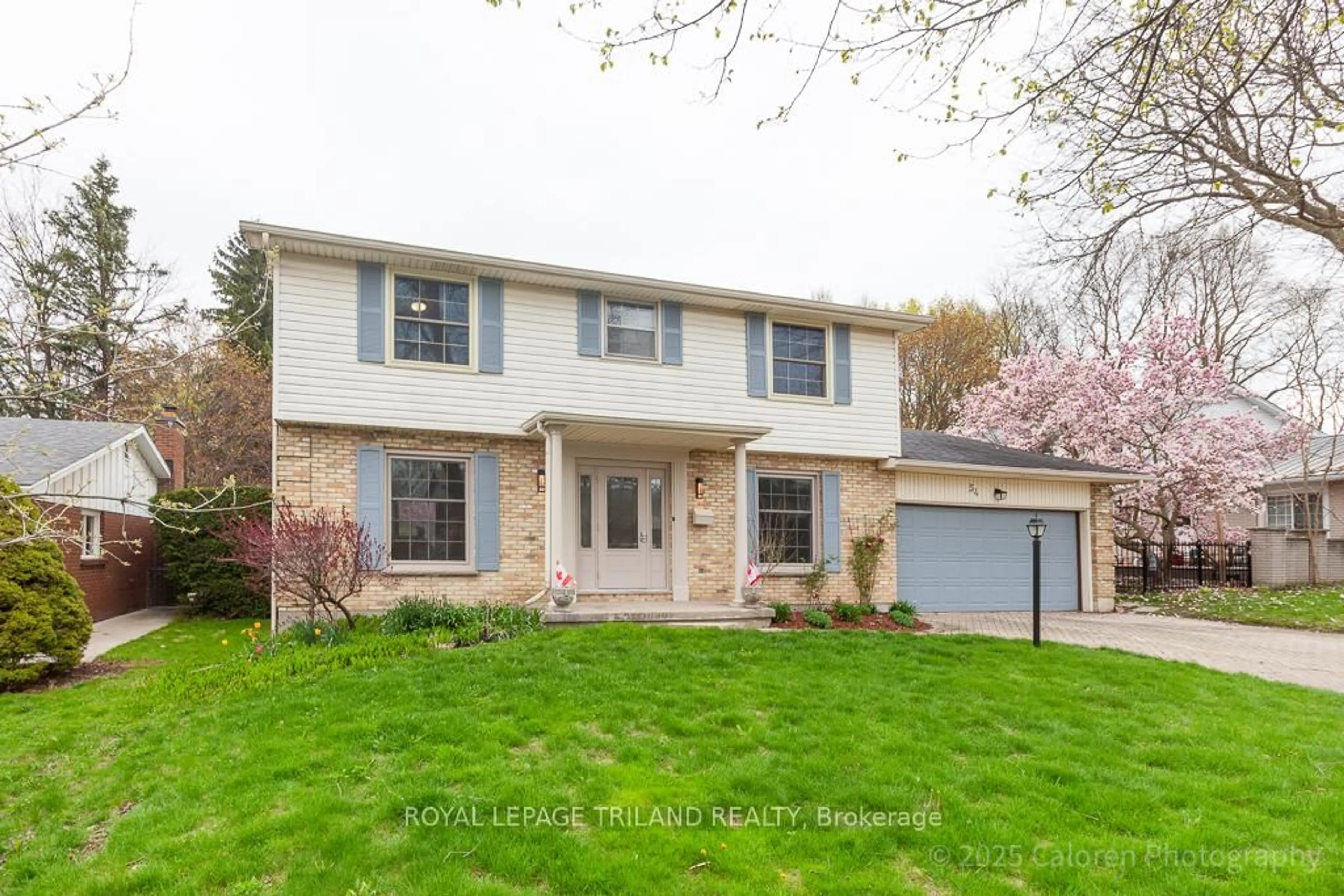 Home with vinyl exterior material, street for 54 Runnymede Cres, London North Ontario N6G 1Z8