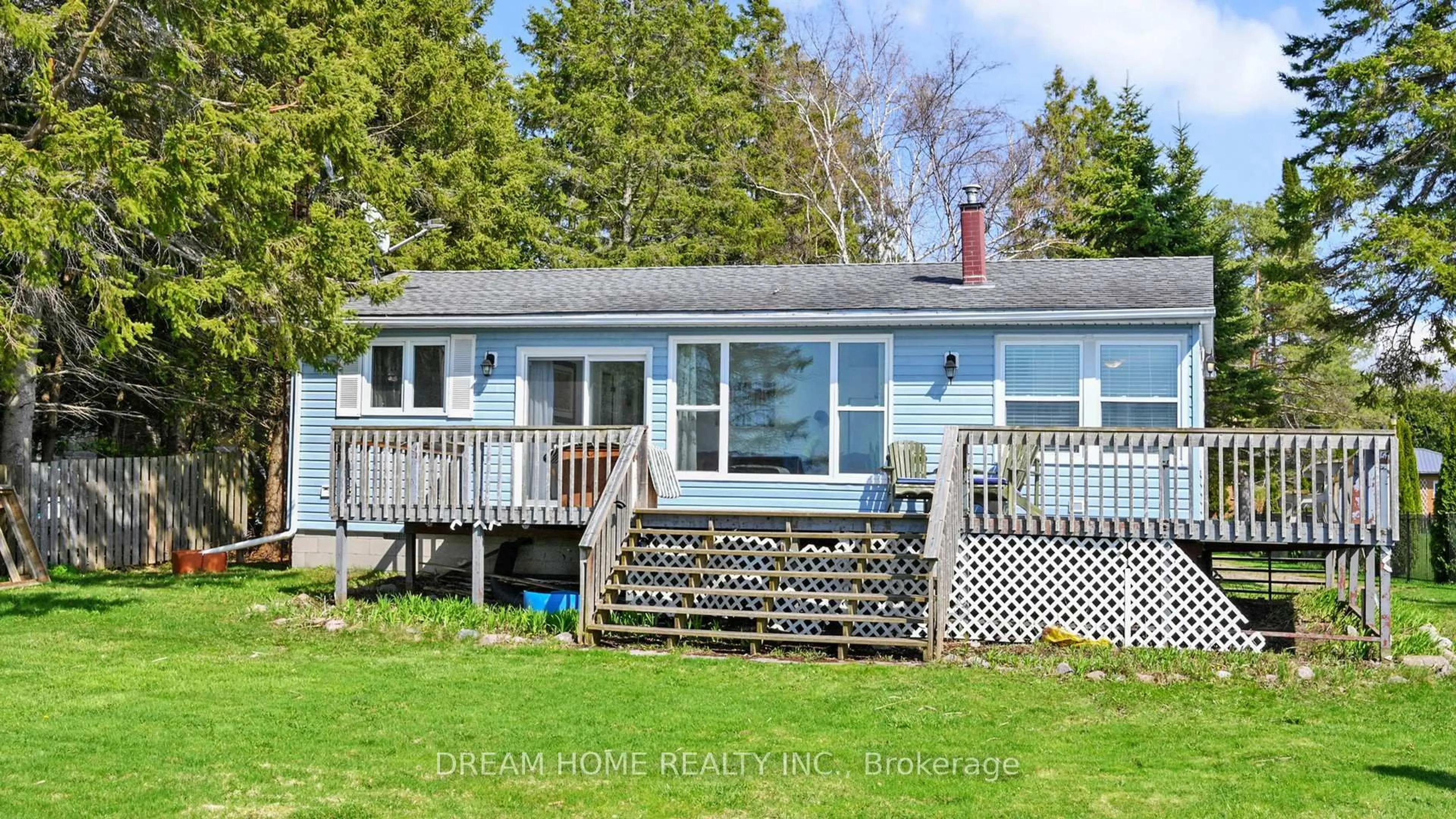 A pic from outside/outdoor area/front of a property/back of a property/a pic from drone, water/lake/river/ocean view for 33 Cedar Cres, Kawartha Lakes Ontario L0B 1K0