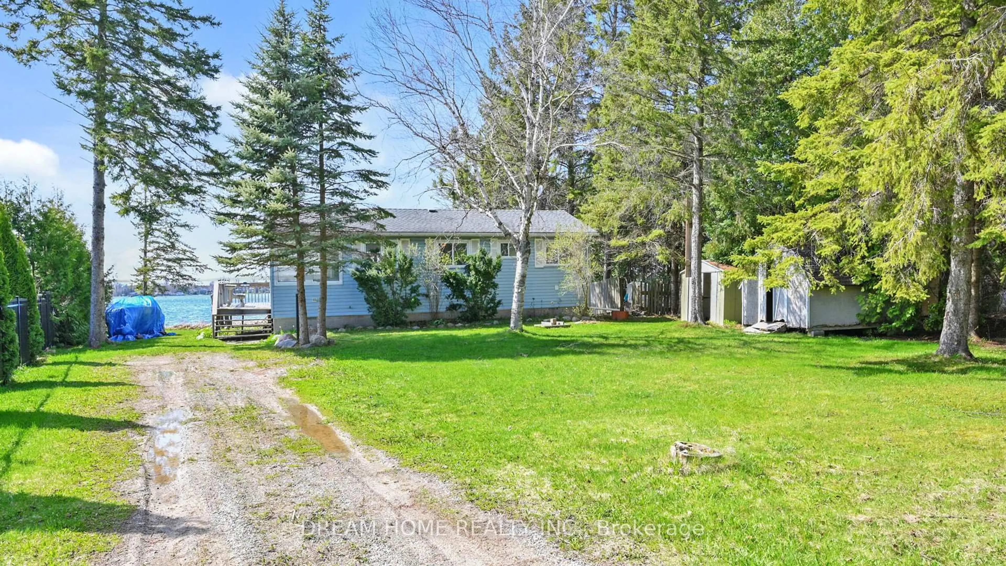 A pic from outside/outdoor area/front of a property/back of a property/a pic from drone, water/lake/river/ocean view for 33 Cedar Cres, Kawartha Lakes Ontario L0B 1K0