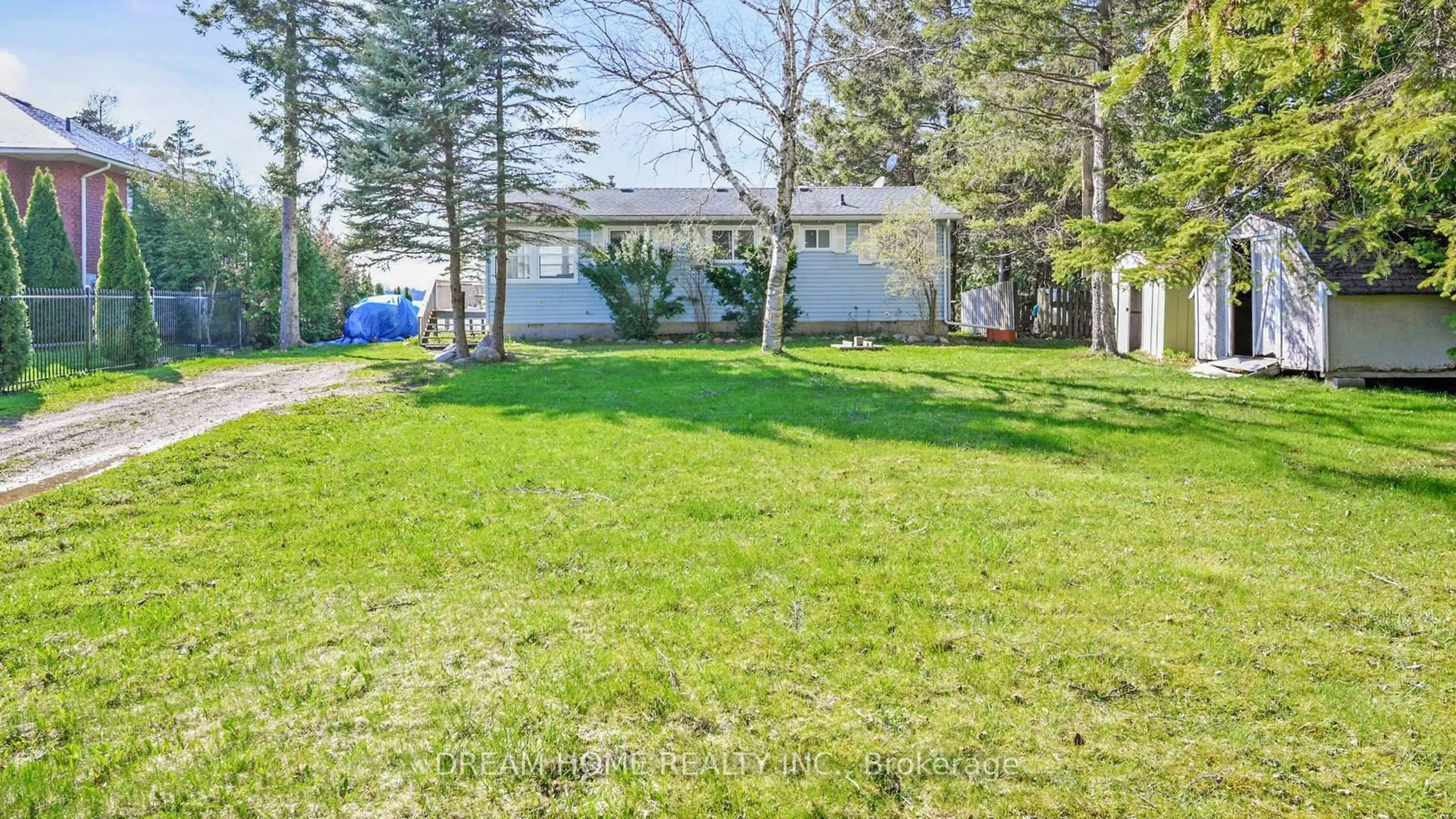 A pic from outside/outdoor area/front of a property/back of a property/a pic from drone, water/lake/river/ocean view for 33 Cedar Cres, Kawartha Lakes Ontario L0B 1K0
