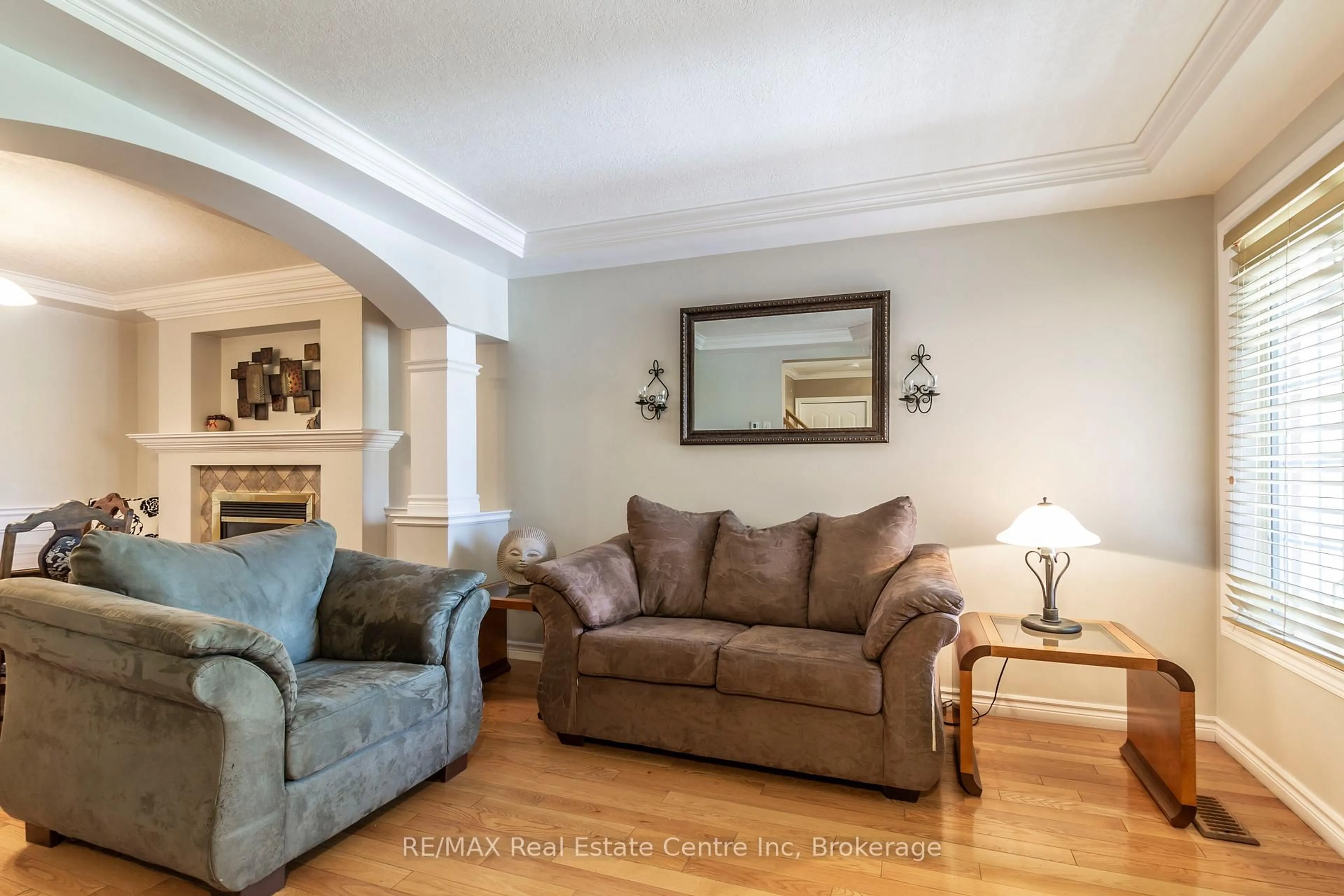 Living room with furniture, wood/laminate floor for 40 Bailey Ave, Guelph Ontario N1H 8N3