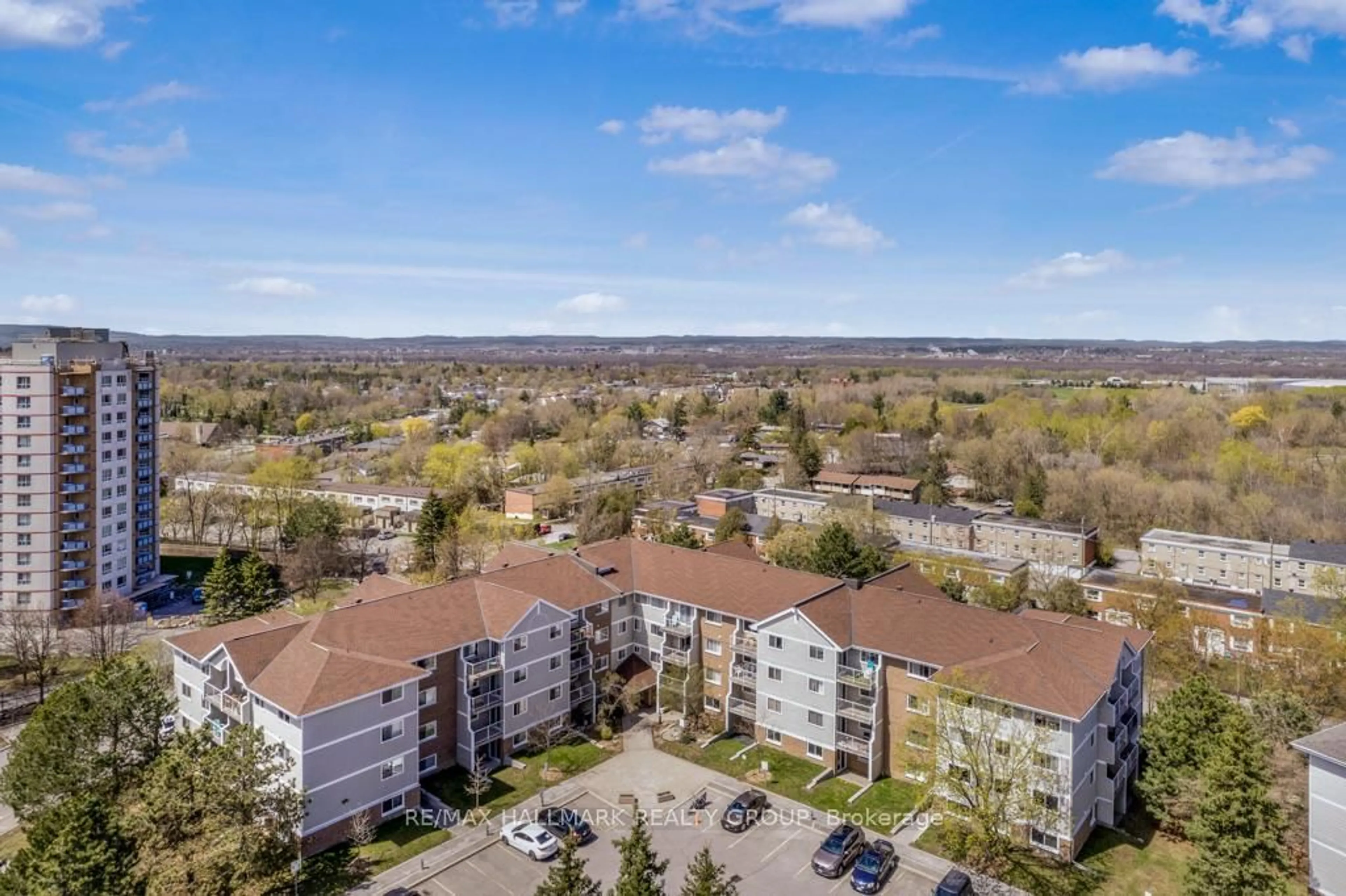 A pic from outside/outdoor area/front of a property/back of a property/a pic from drone, city buildings view from balcony for 270 Brittany Dr #203, Ottawa Ontario K1K 4M3