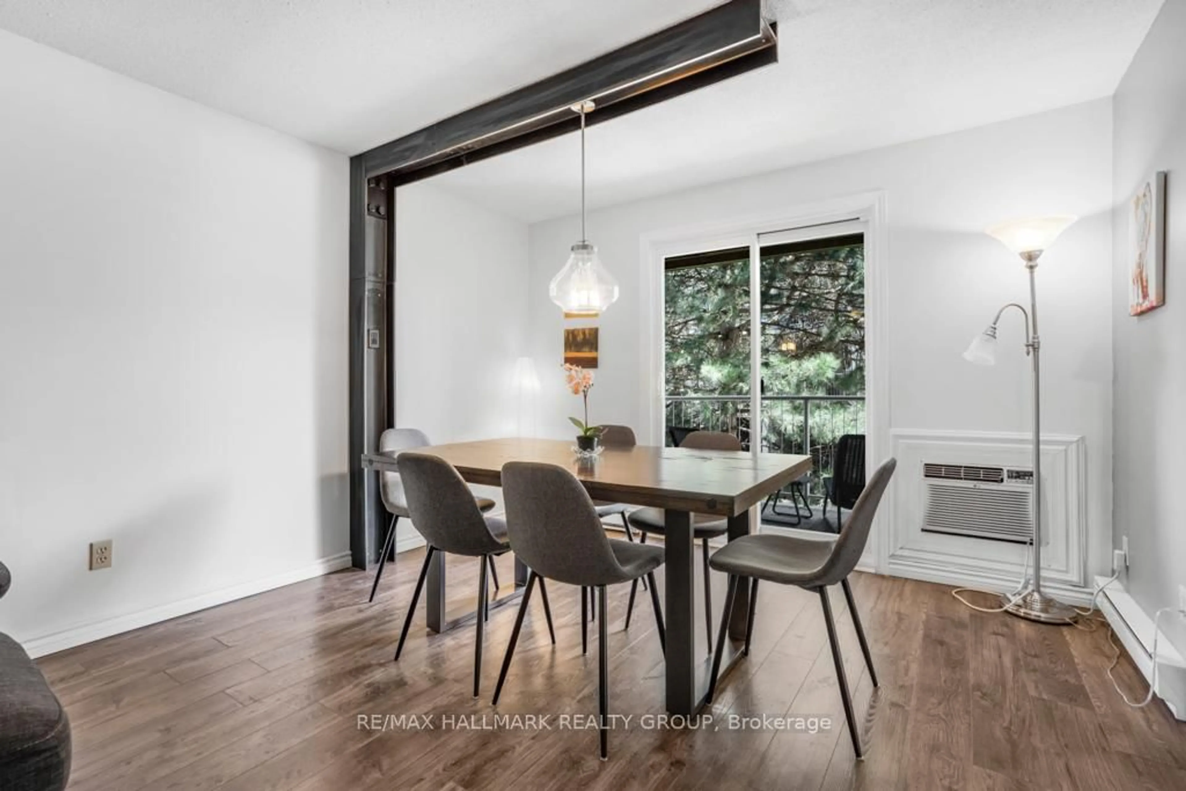 Dining room, wood/laminate floor for 270 Brittany Dr #203, Ottawa Ontario K1K 4M3