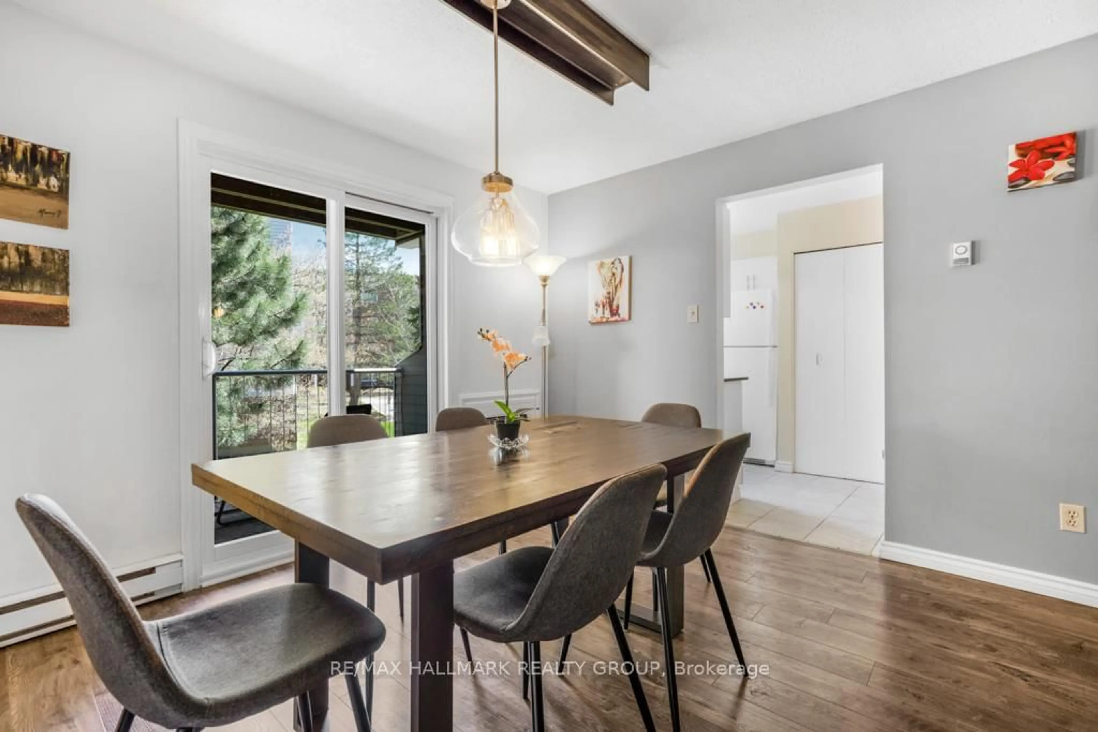 Dining room, wood/laminate floor for 270 Brittany Dr #203, Ottawa Ontario K1K 4M3