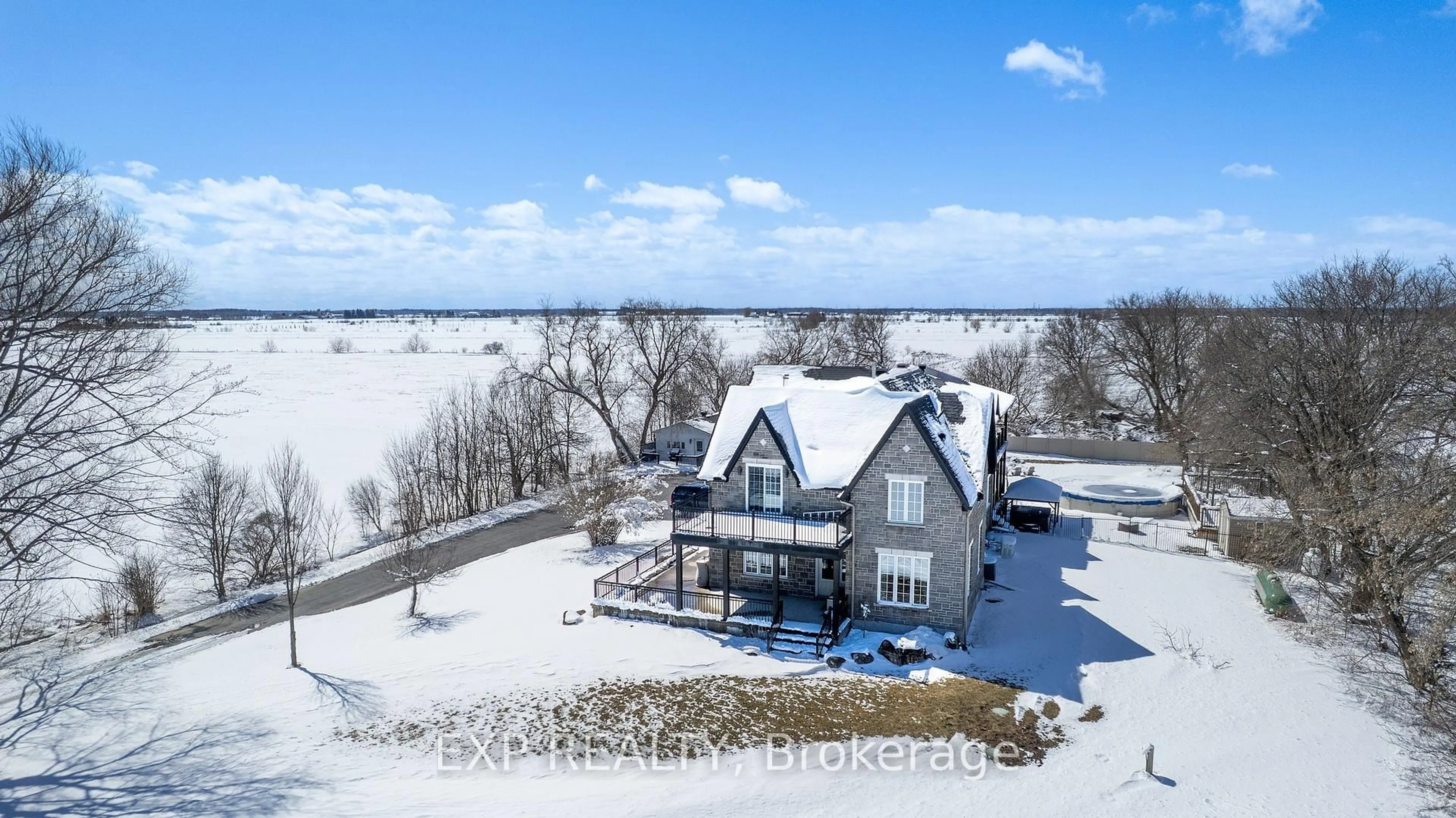 A pic from outside/outdoor area/front of a property/back of a property/a pic from drone, water/lake/river/ocean view for 2754 Eagleson Rd, Ottawa Ontario K2S 1B8