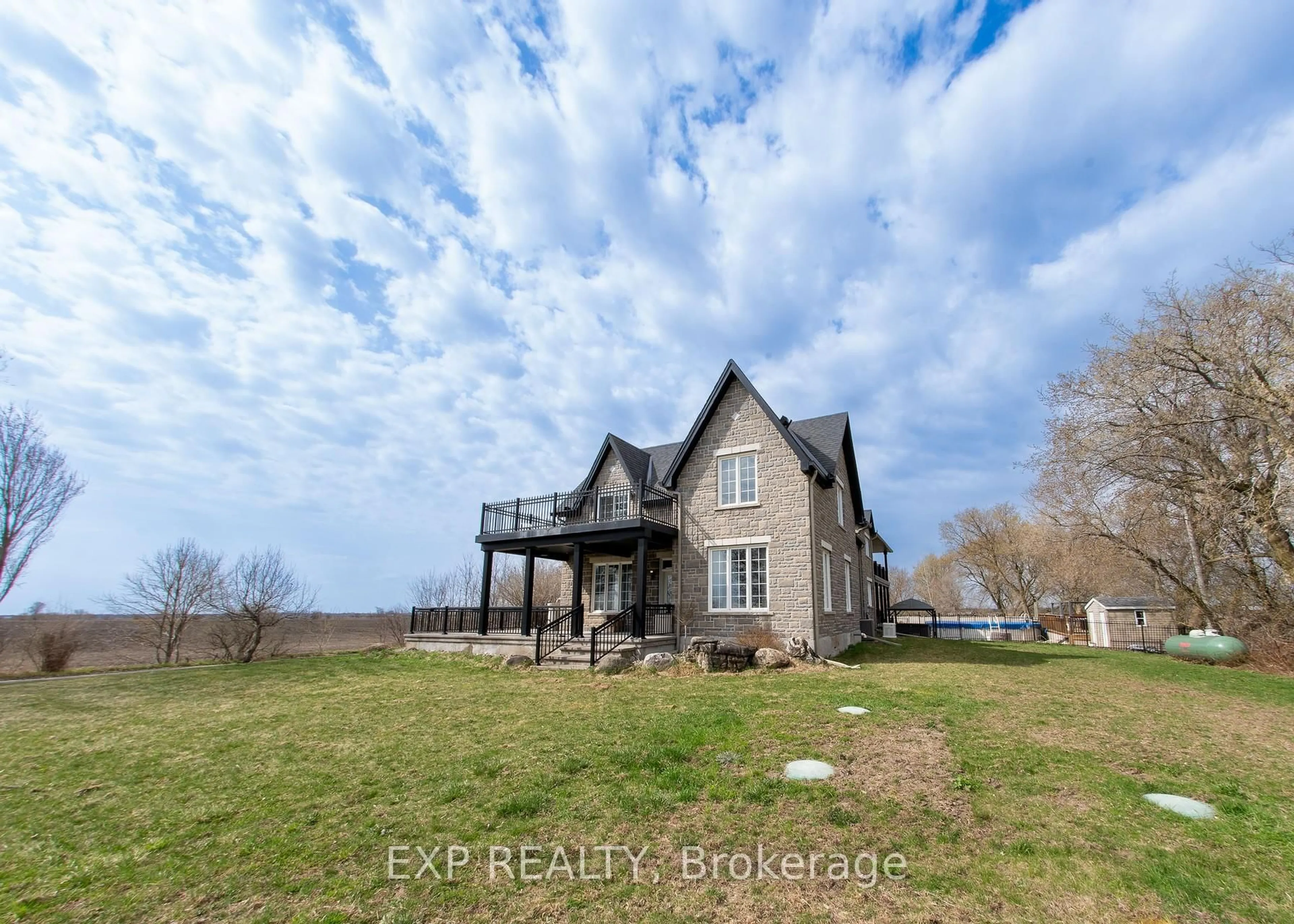 A pic from outside/outdoor area/front of a property/back of a property/a pic from drone, water/lake/river/ocean view for 2754 Eagleson Rd, Ottawa Ontario K2S 1B8