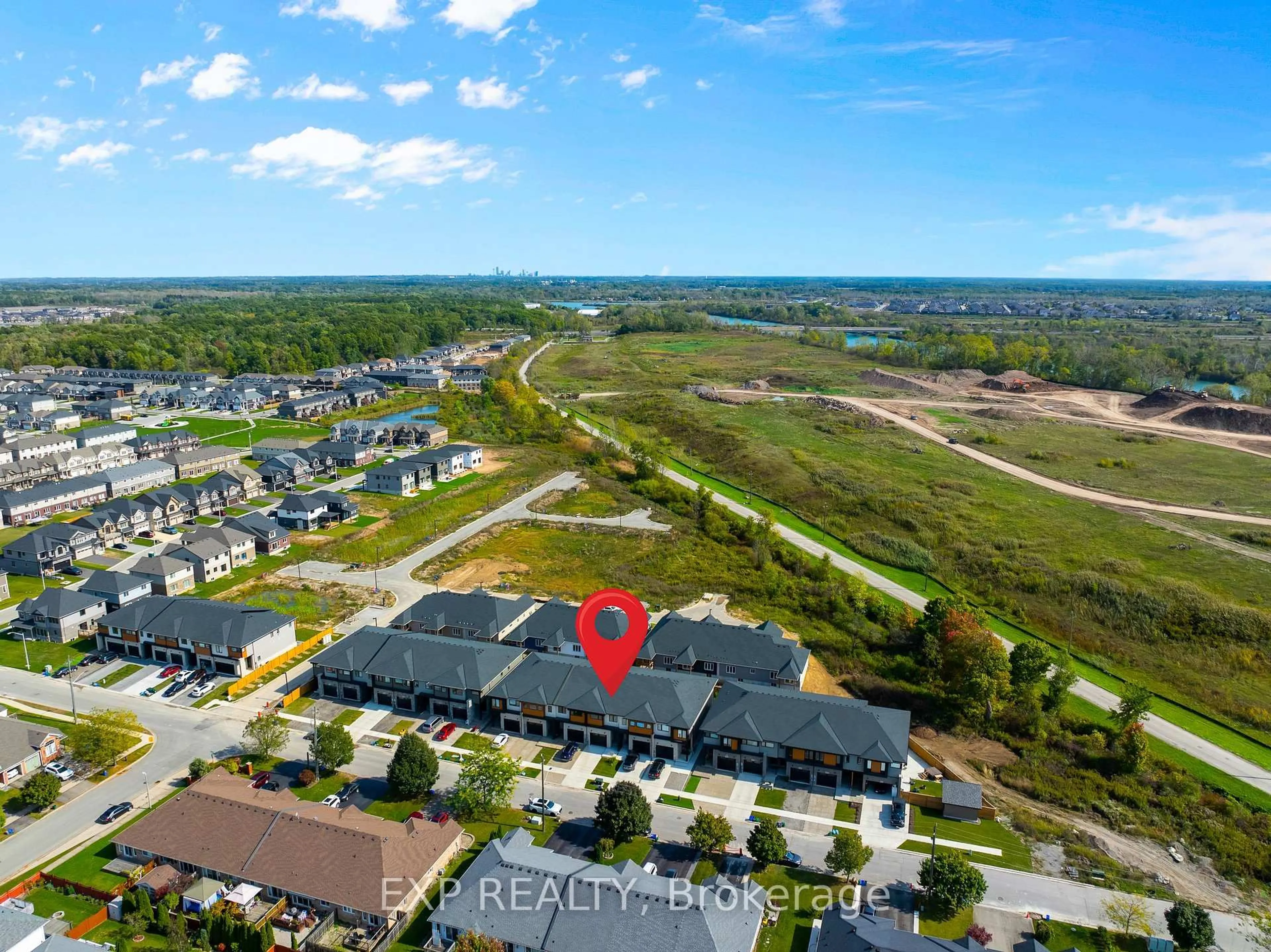 A pic from outside/outdoor area/front of a property/back of a property/a pic from drone, water/lake/river/ocean view for 1030 HANSLER Rd, Welland Ontario L3C 7H7