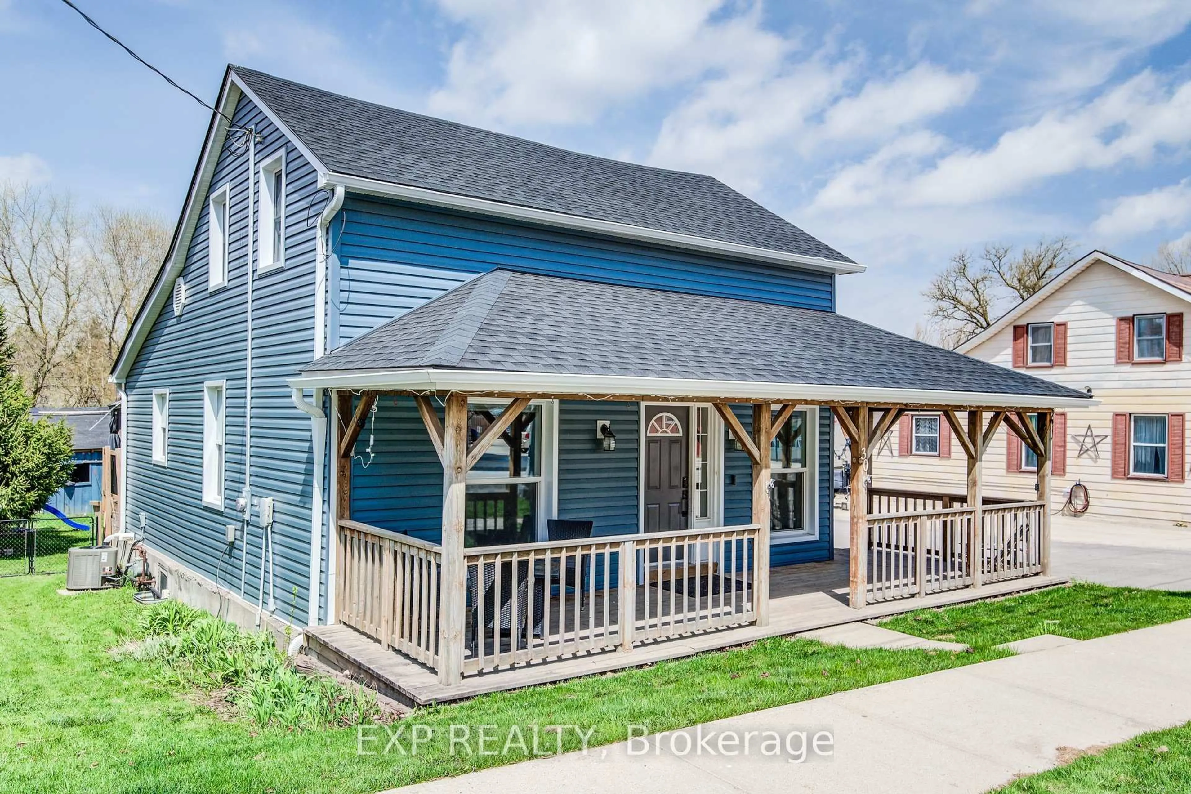 Home with vinyl exterior material, street for 30 Wellington St, Mapleton Ontario N0G 1P0