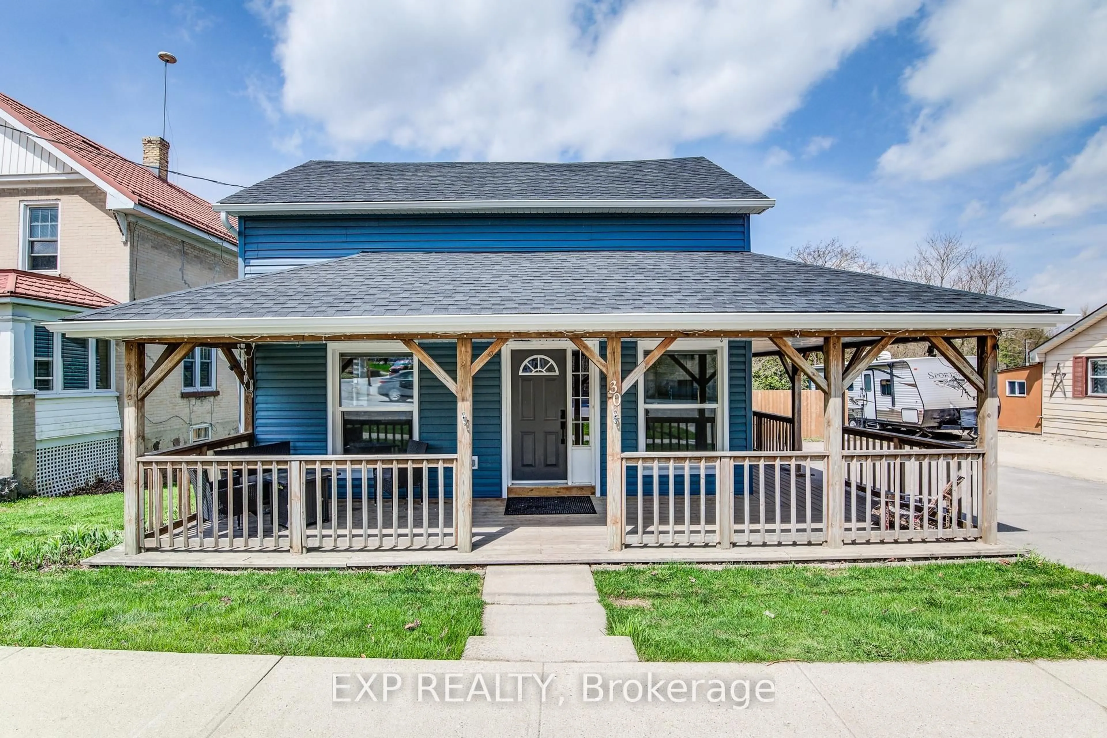 Home with vinyl exterior material, street for 30 Wellington St, Mapleton Ontario N0G 1P0