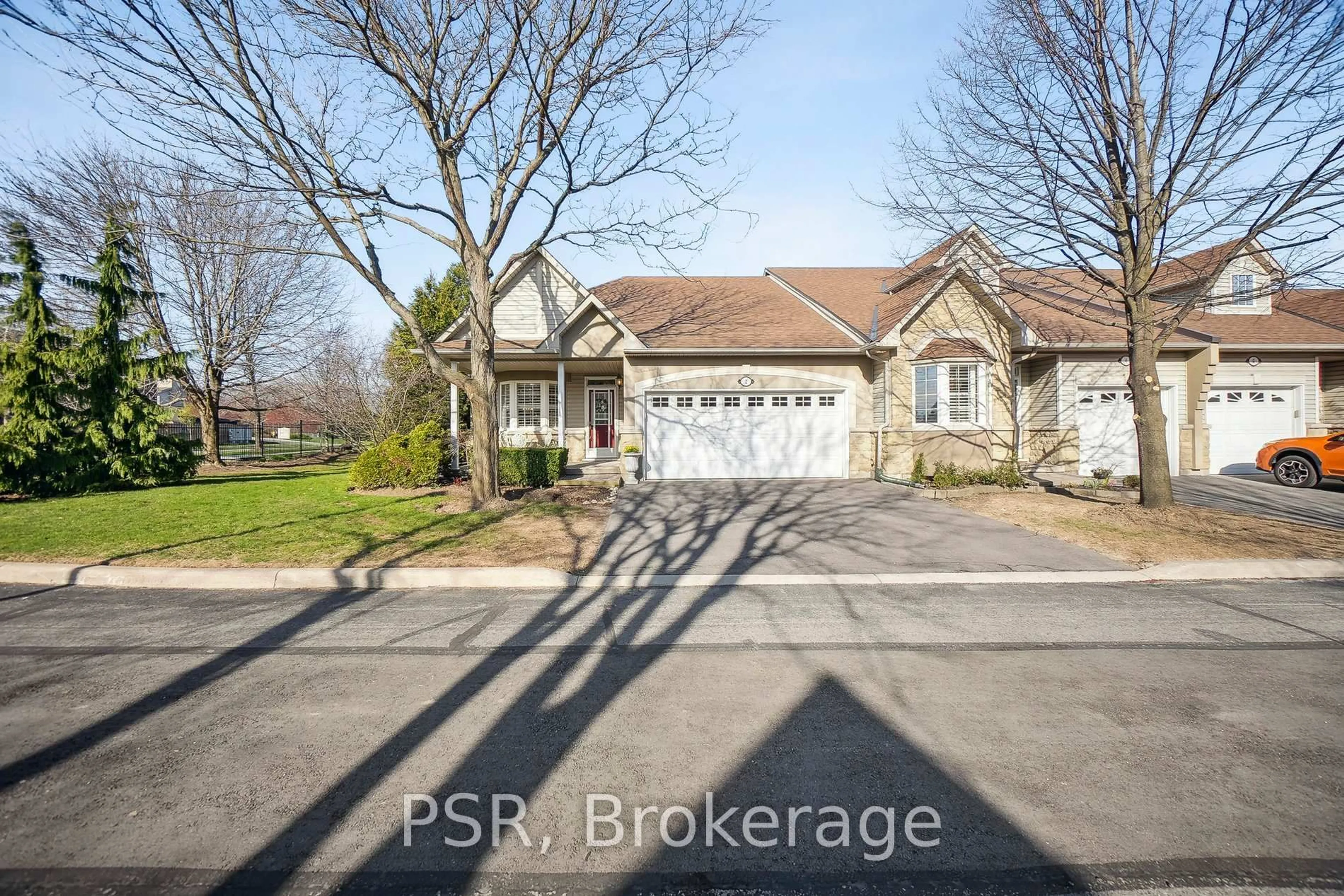 A pic from outside/outdoor area/front of a property/back of a property/a pic from drone, street for 212 Stonehenge Dr #2, Hamilton Ontario L9K 1N4