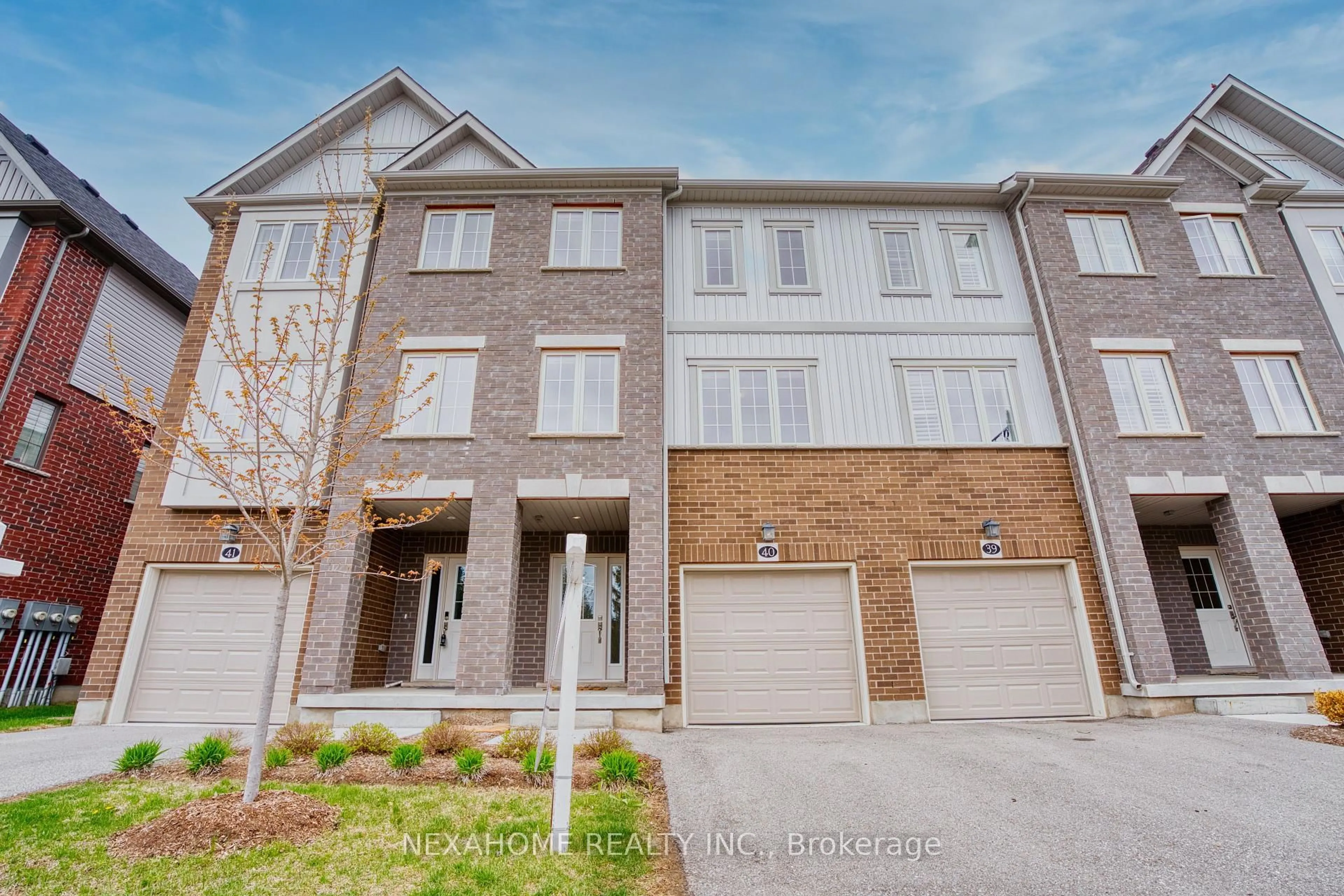 Home with brick exterior material, street for 311 Woolwich St, Waterloo Ontario N2K 0H4
