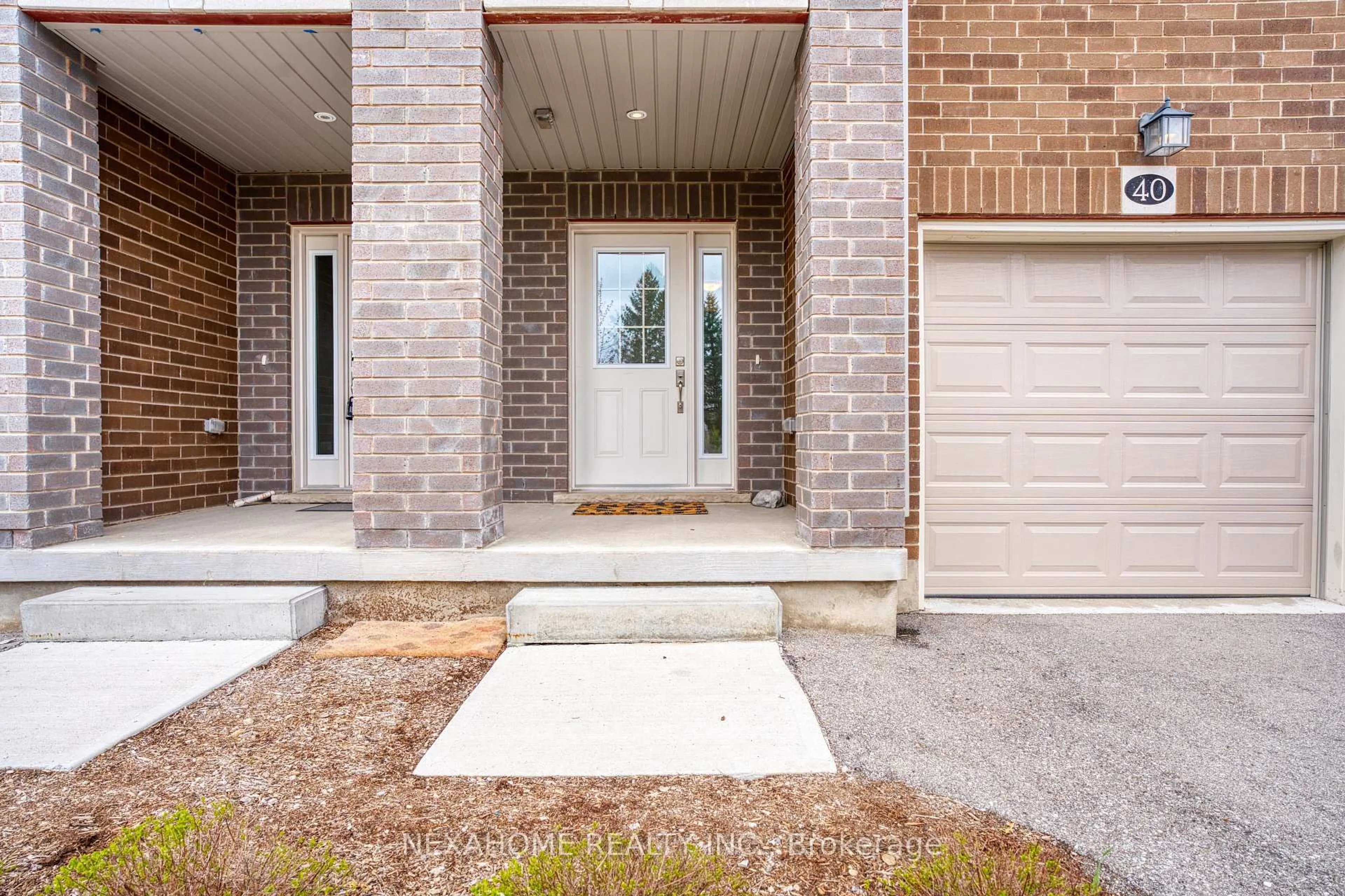 Home with brick exterior material, street for 311 Woolwich St, Waterloo Ontario N2K 0H4
