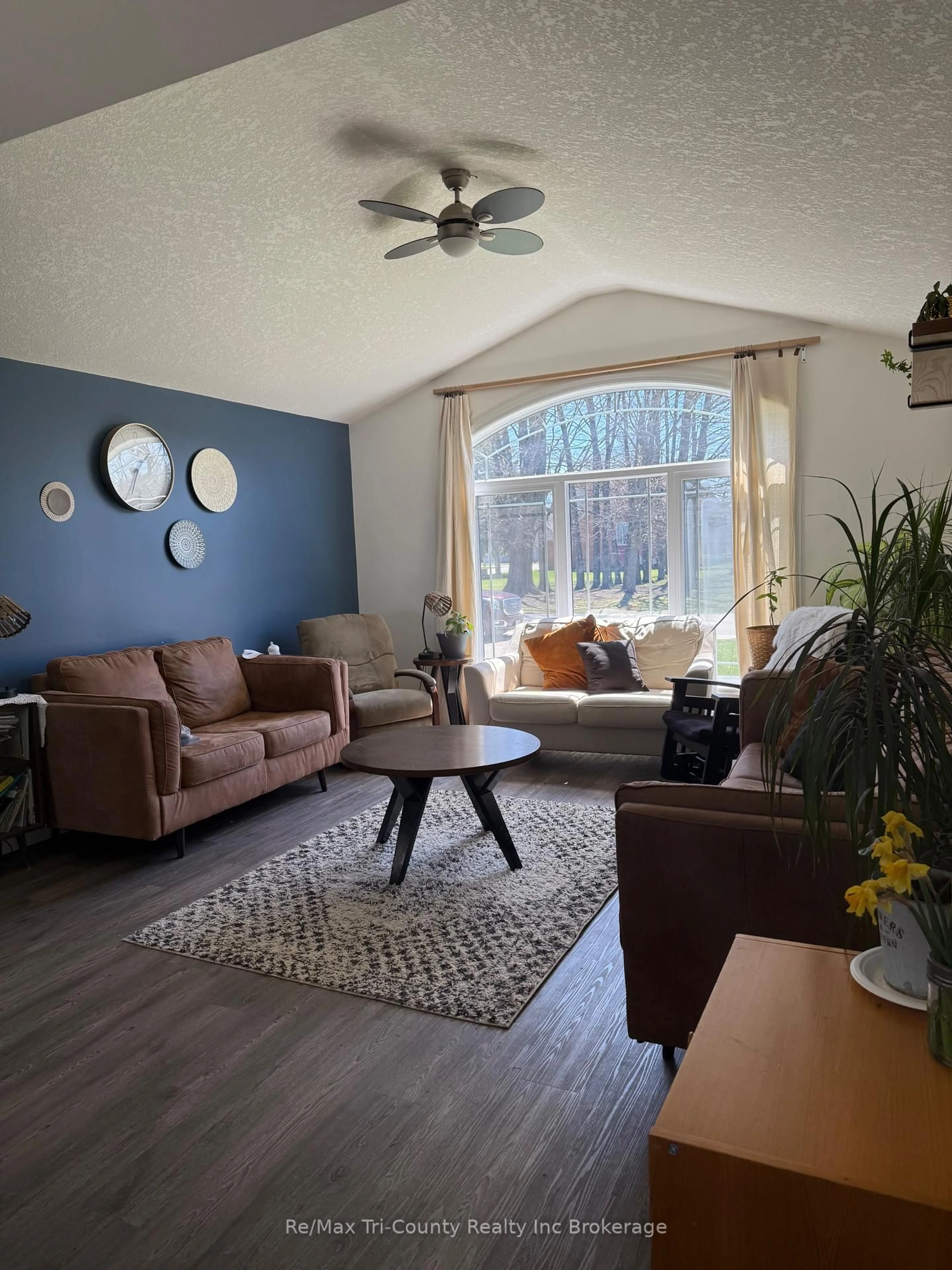 Living room with furniture, wood/laminate floor for 56246 Donnelly Dr, Bayham Ontario N0J 1Y0