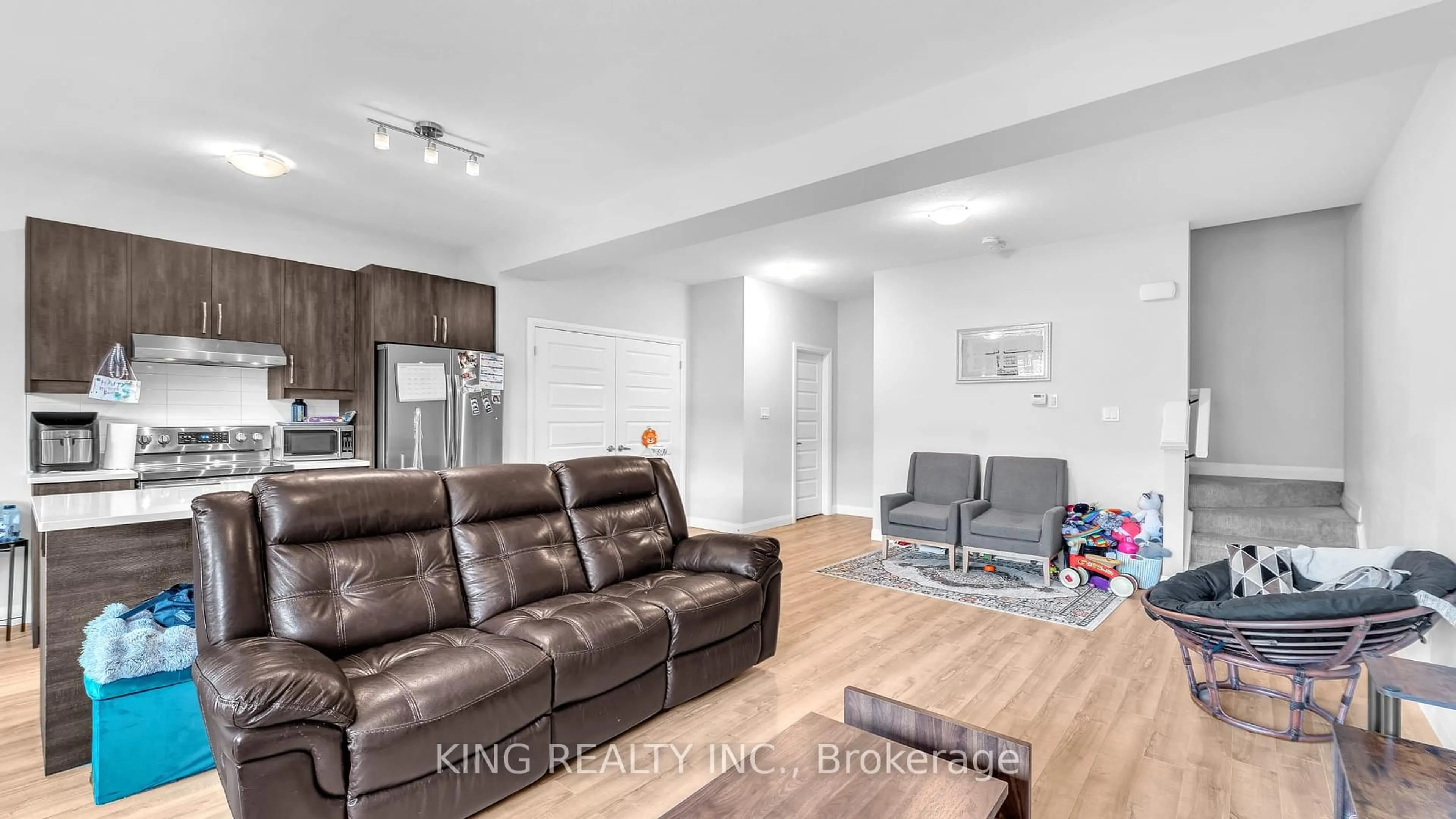 Living room with furniture, wood/laminate floor for 819 KLEINBURG Dr #55, London North Ontario N5X 1K0