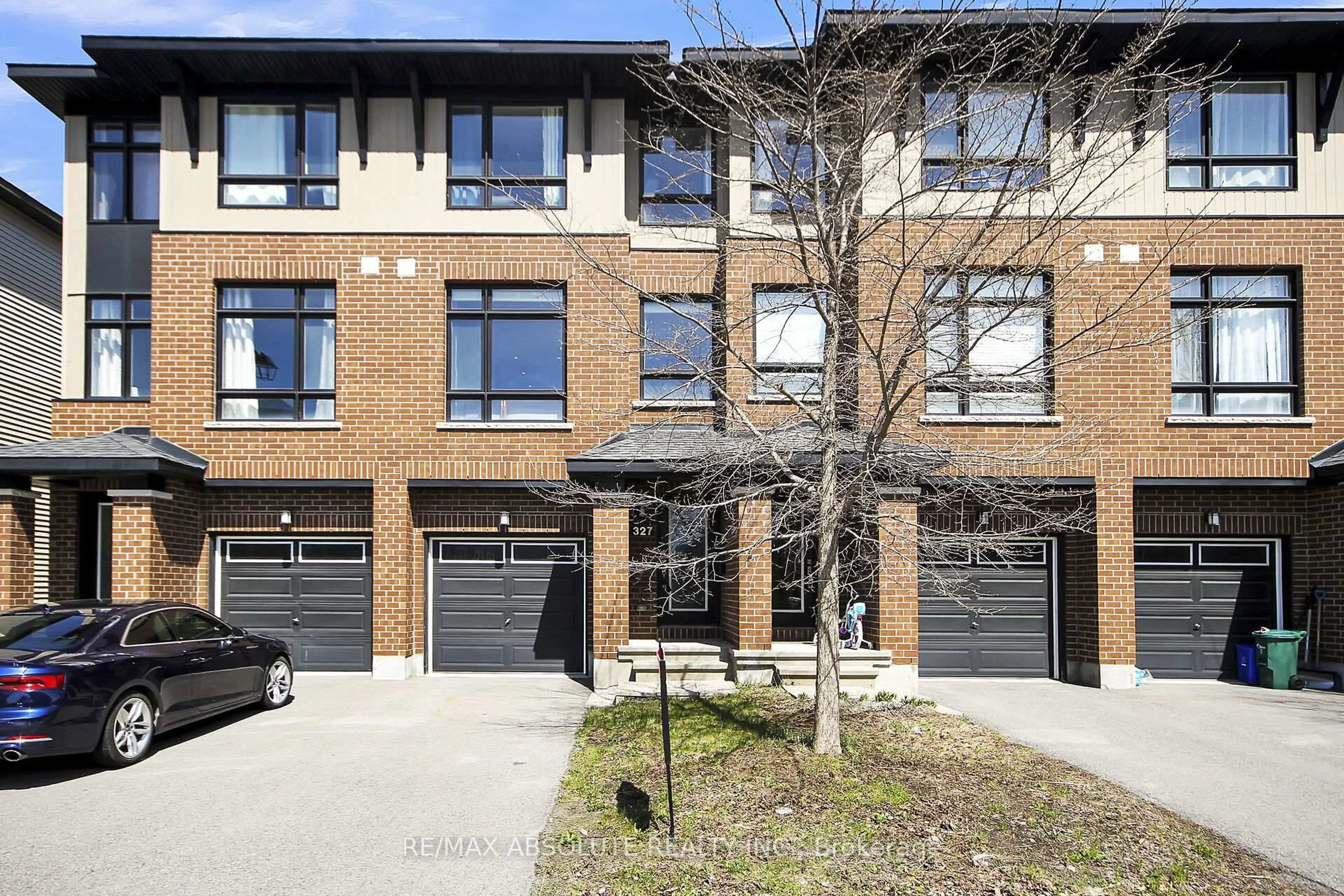 Home with brick exterior material, street for 327 Twinflower Way, Ottawa Ontario K2J 5Z6