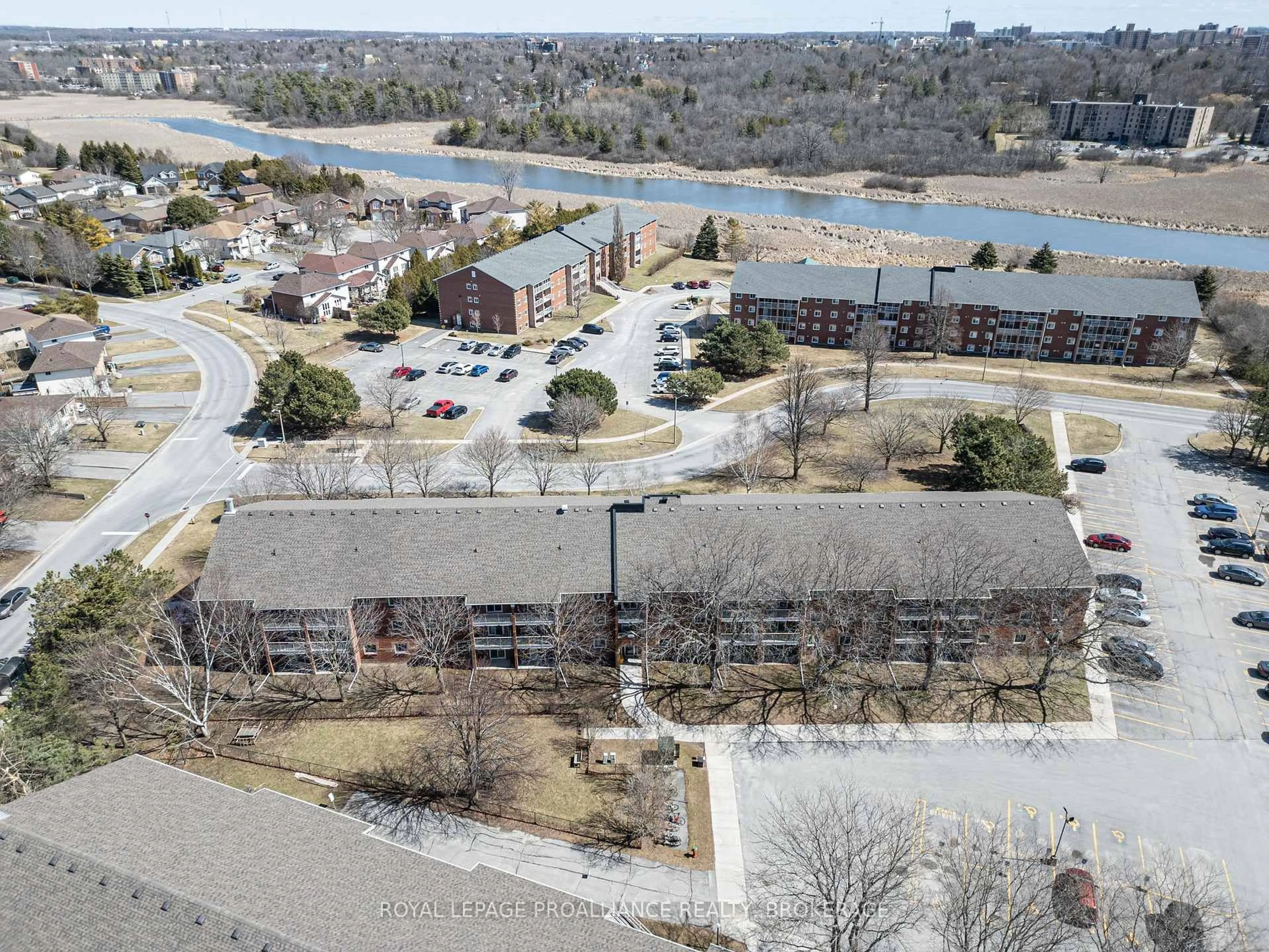 A pic from outside/outdoor area/front of a property/back of a property/a pic from drone, water/lake/river/ocean view for 573 Armstrong Rd #110, Kingston Ontario K7M 8J8