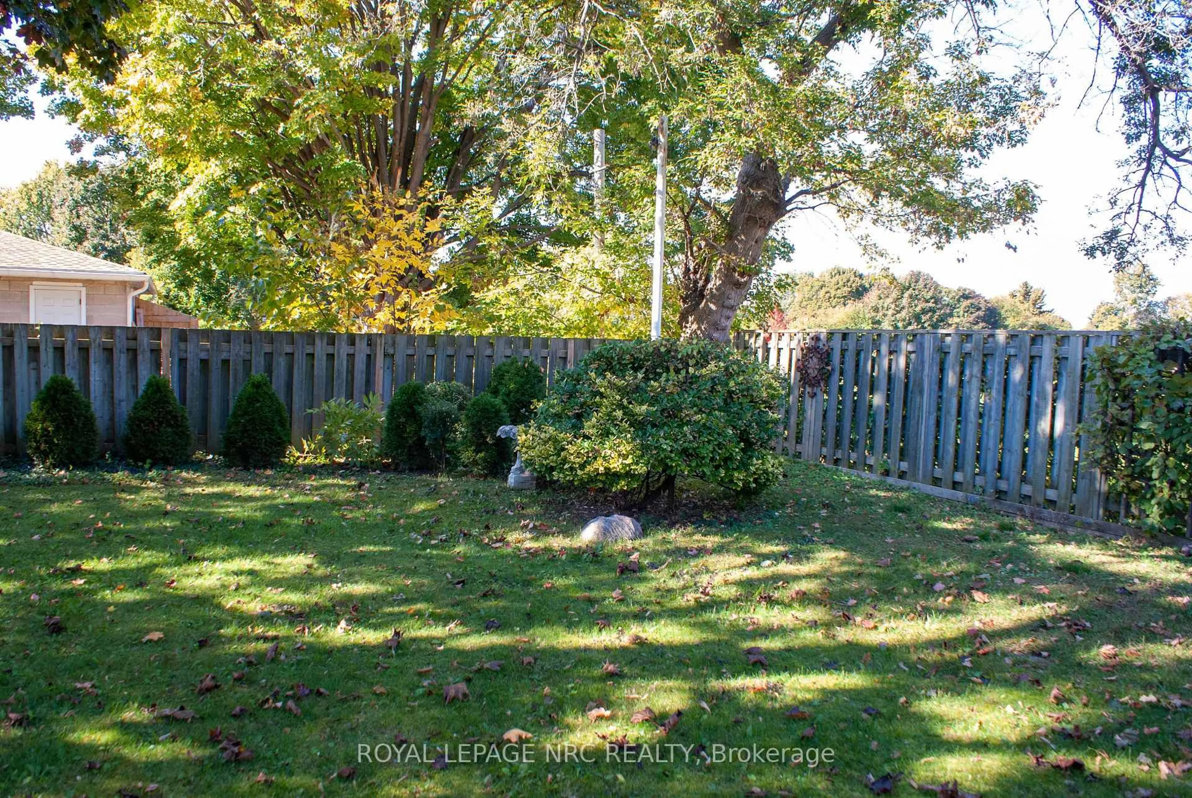 A pic from outside/outdoor area/front of a property/back of a property/a pic from drone, forest/trees view for 553 Carlton St, St. Catharines Ontario L2M 4X6
