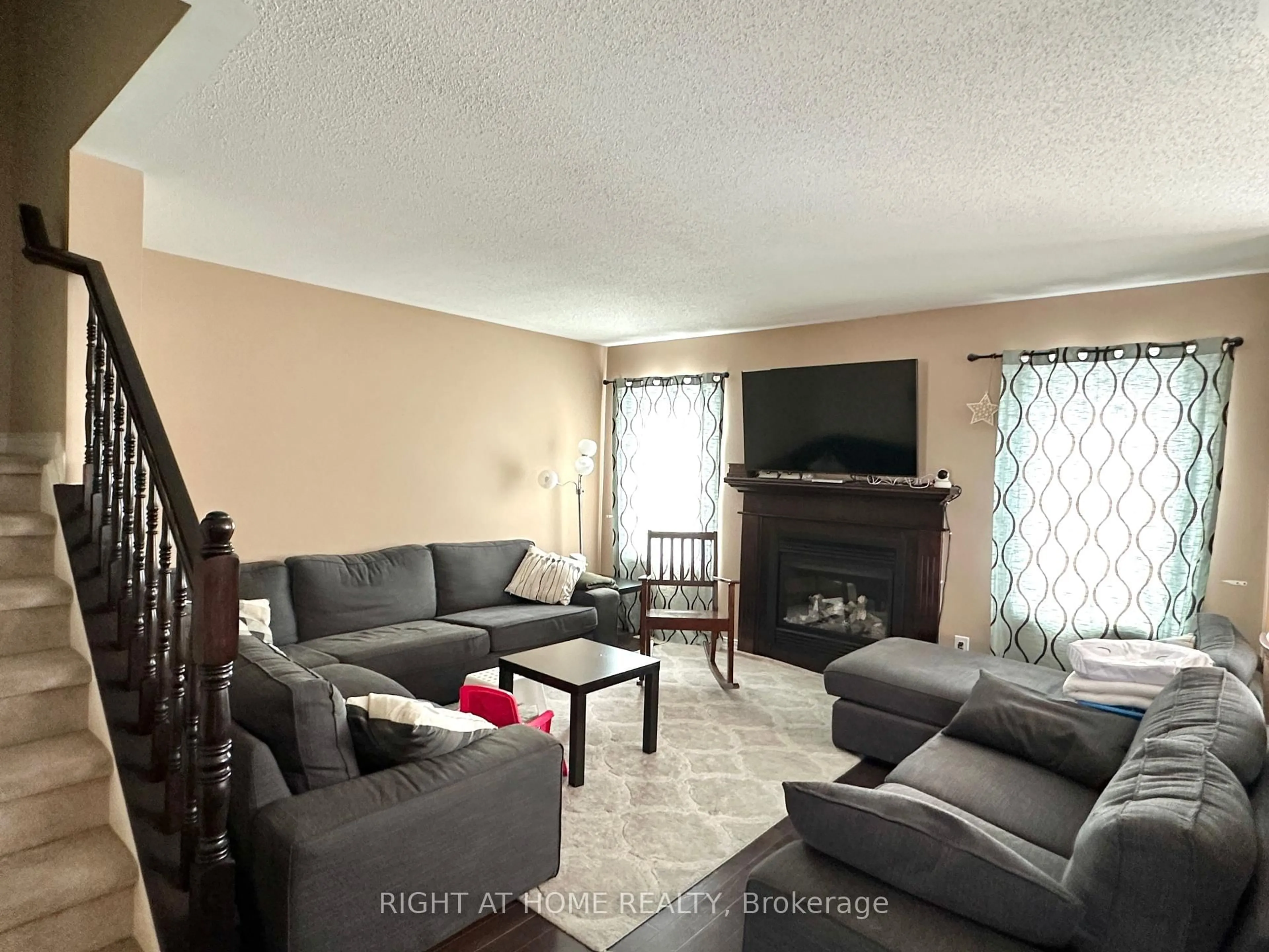 Living room with furniture, unknown for 631 Paul Metivier Dr, Ottawa Ontario K2J 0Y2