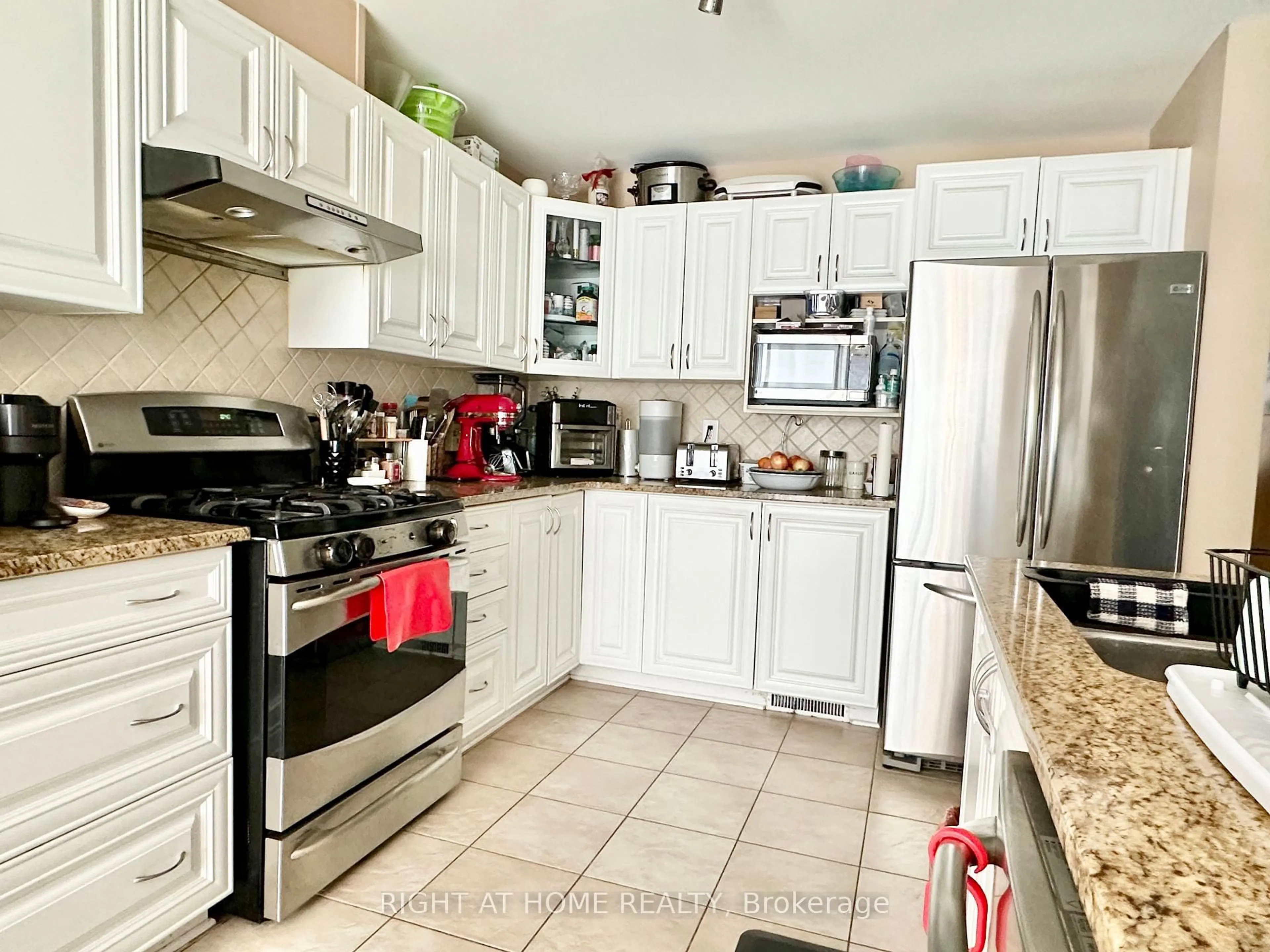 Open concept kitchen, ceramic/tile floor for 631 Paul Metivier Dr, Ottawa Ontario K2J 0Y2