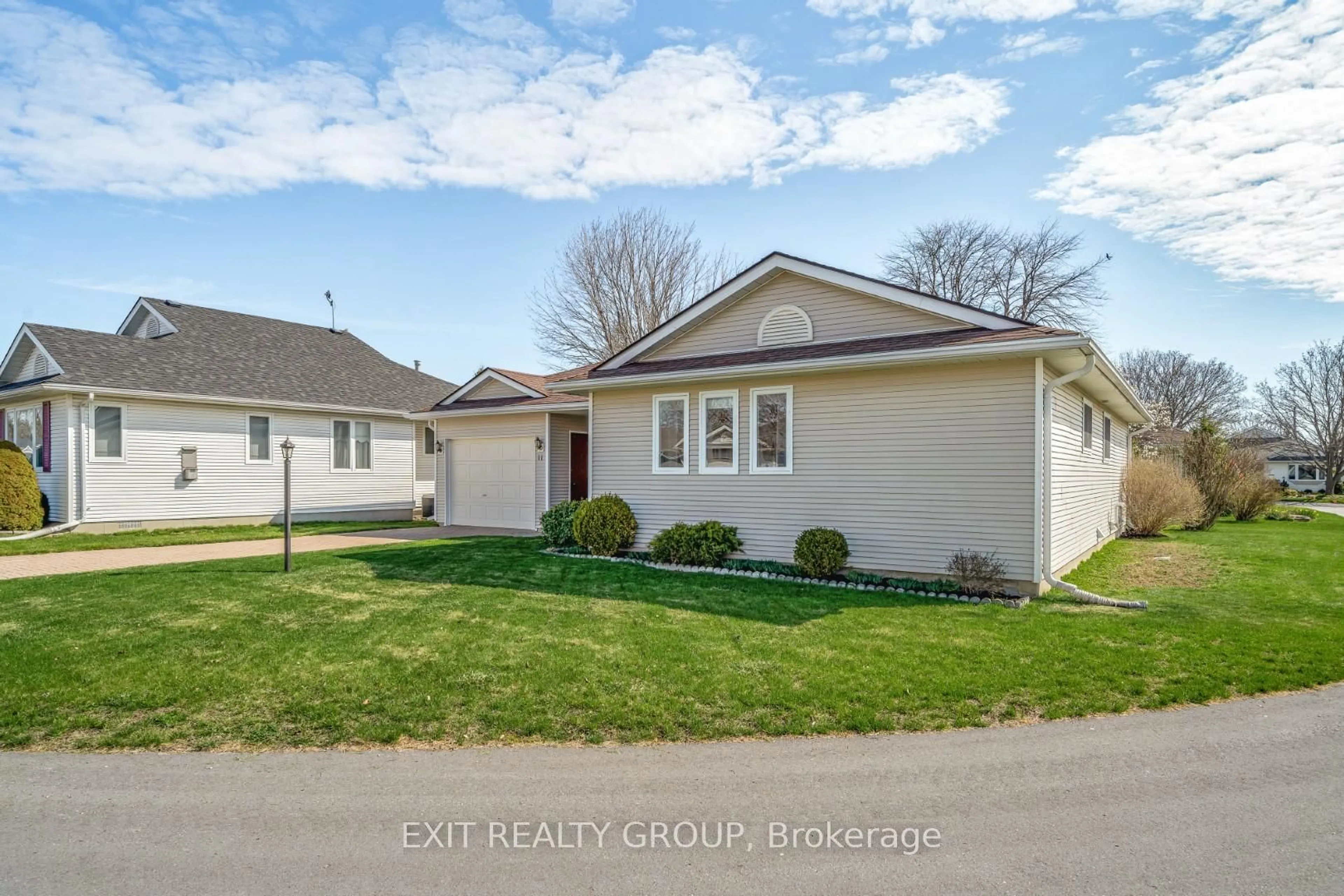 Home with vinyl exterior material, street for 11 Monroe Crt, Prince Edward County Ontario K0K 3L0