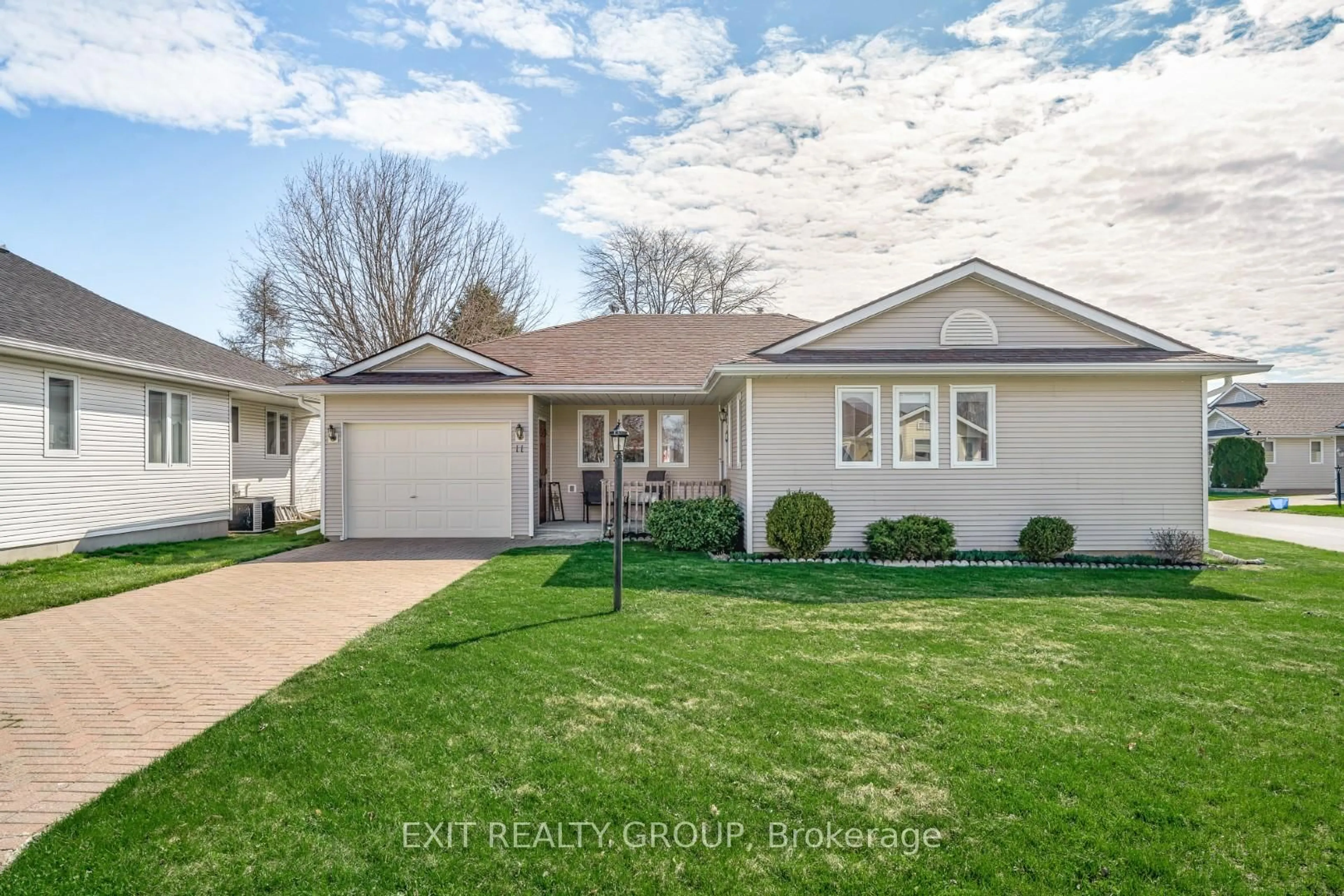 Home with vinyl exterior material, street for 11 Monroe Crt, Prince Edward County Ontario K0K 3L0