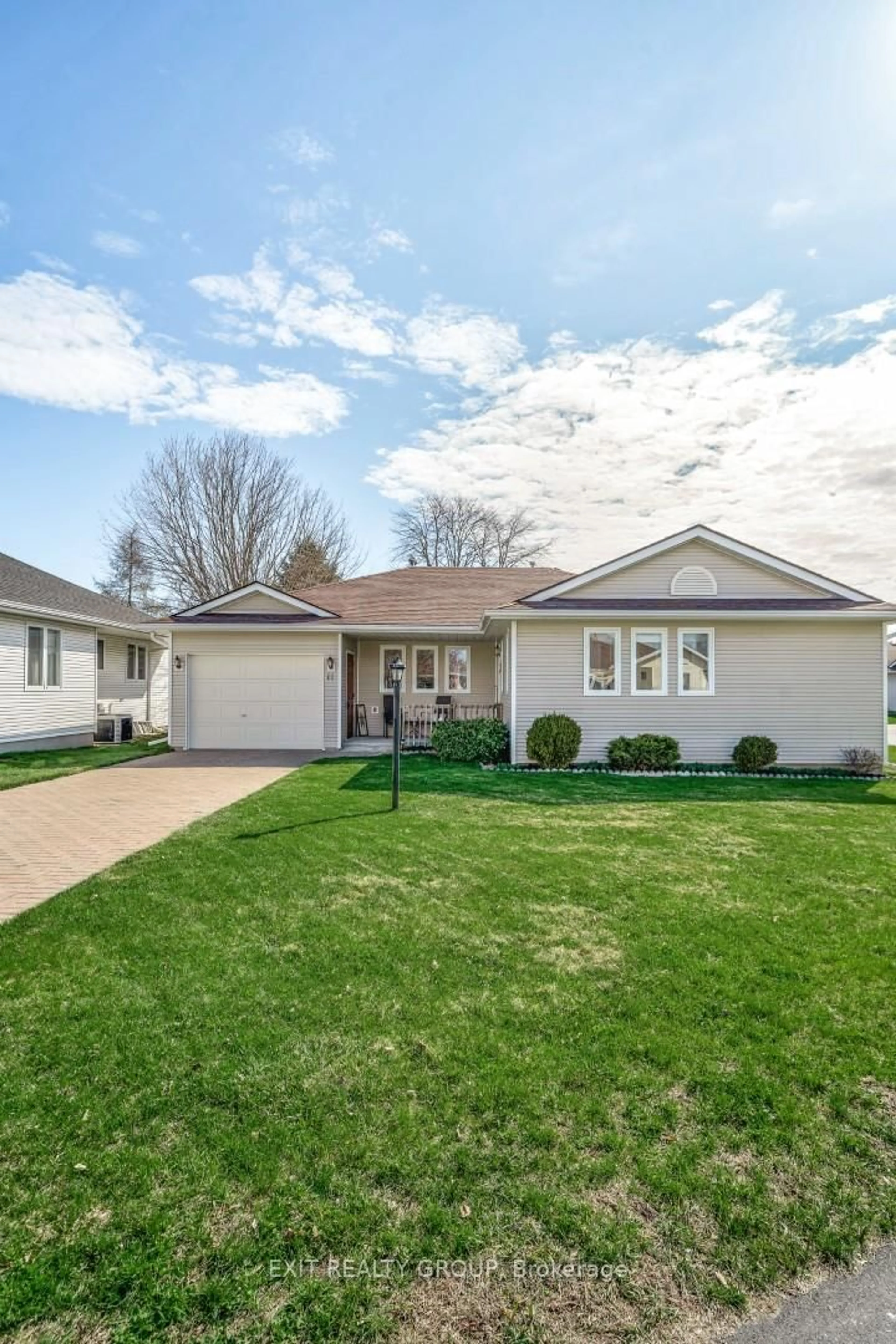 Home with vinyl exterior material, street for 11 Monroe Crt, Prince Edward County Ontario K0K 3L0
