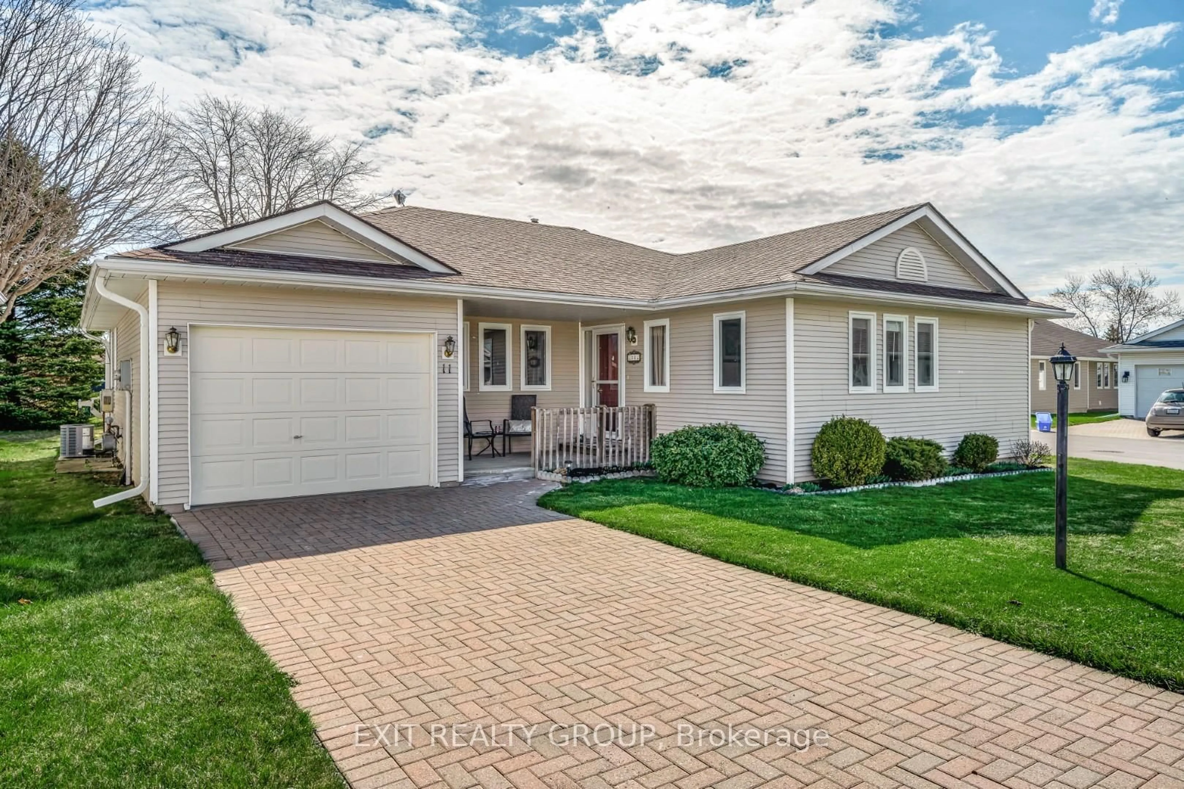 Home with vinyl exterior material, street for 11 Monroe Crt, Prince Edward County Ontario K0K 3L0